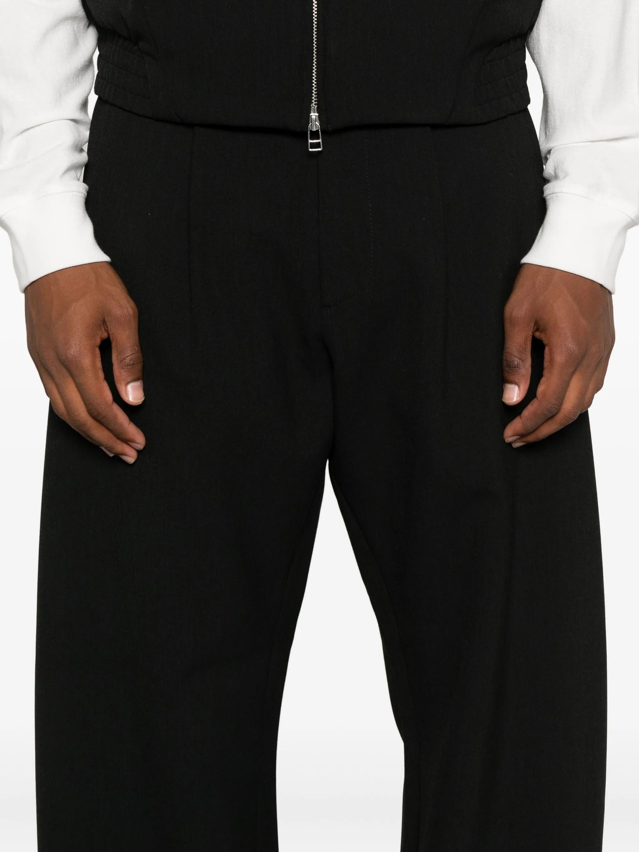 Uvas pleated-front trousers