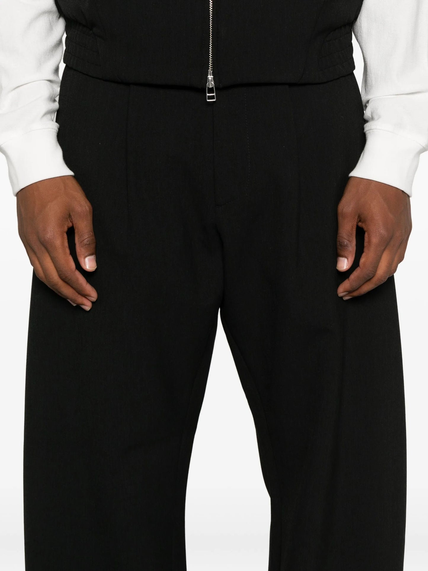 Uvas pleated-front trousers