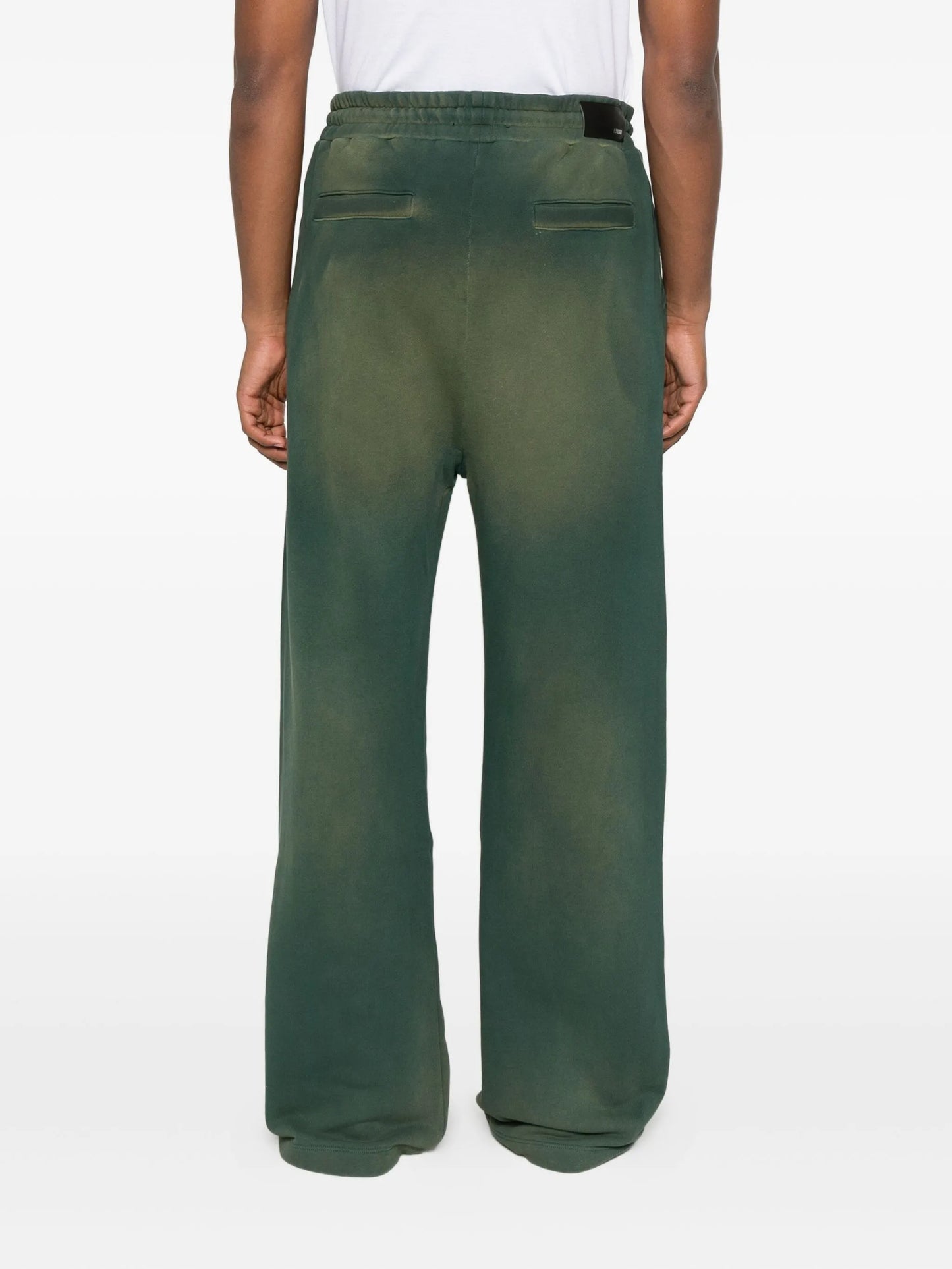 crest-embellished track pants