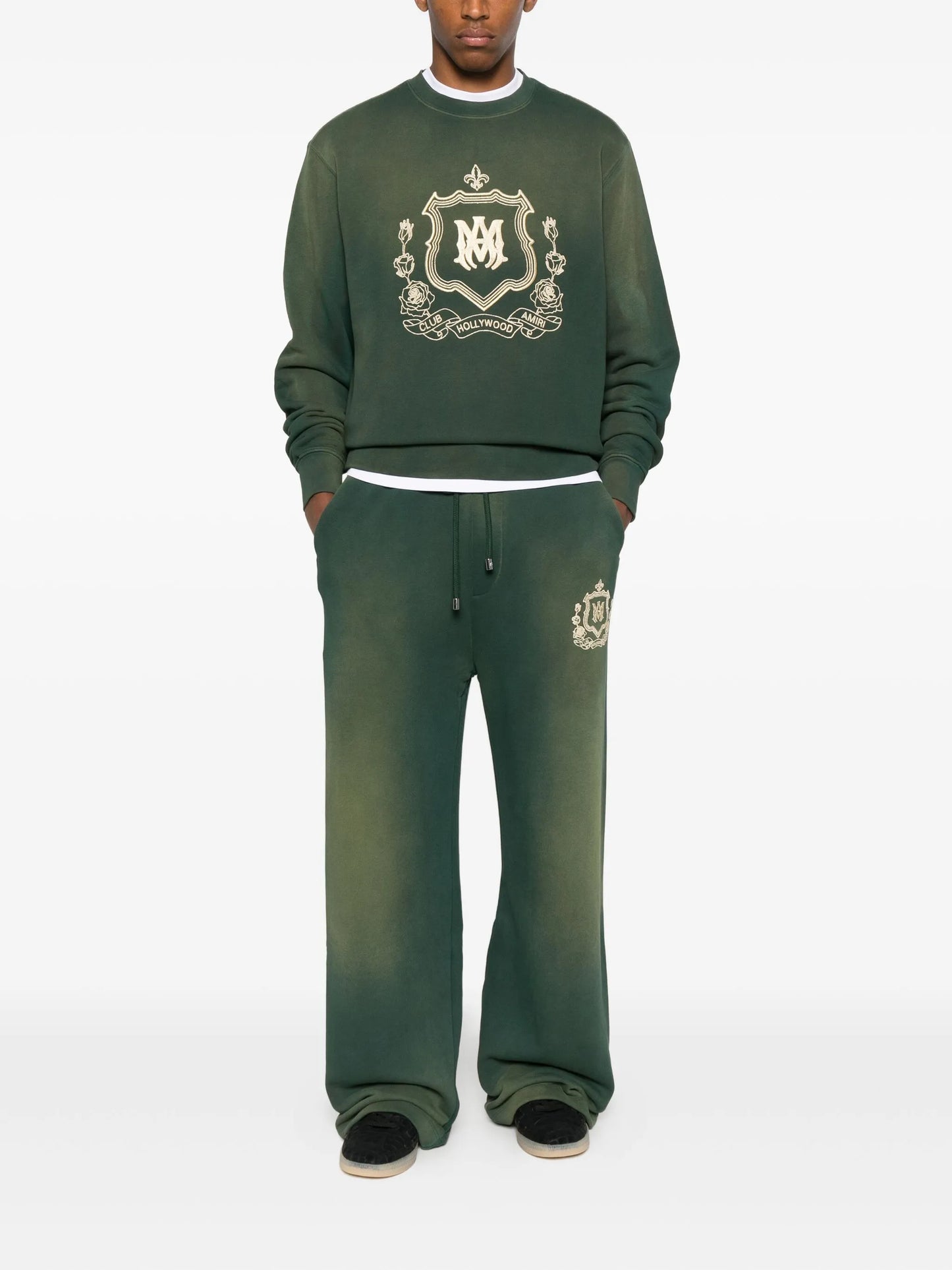 crest-embellished track pants
