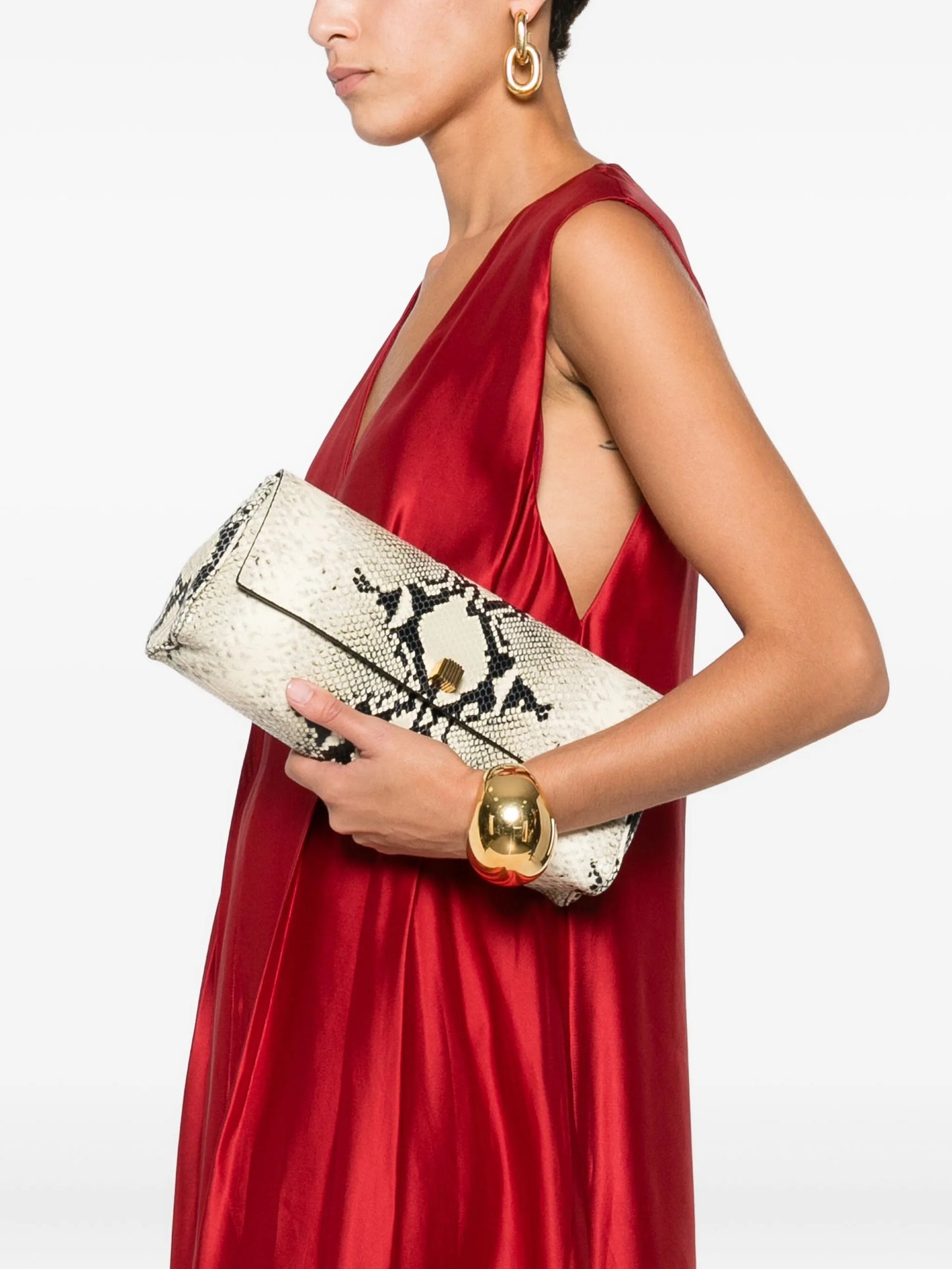 snakeskin flap clutch