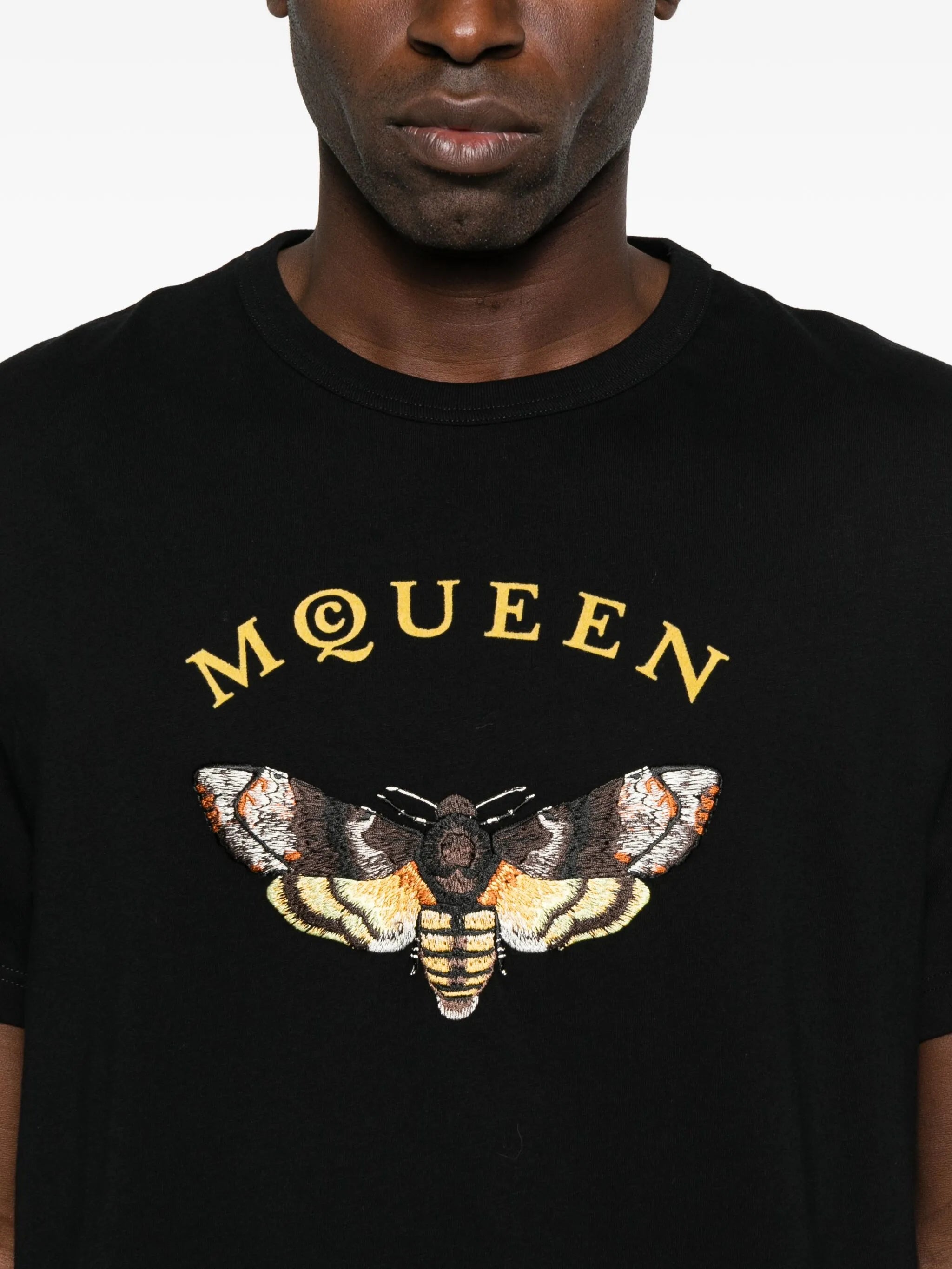 moth-embroidered T-shirt