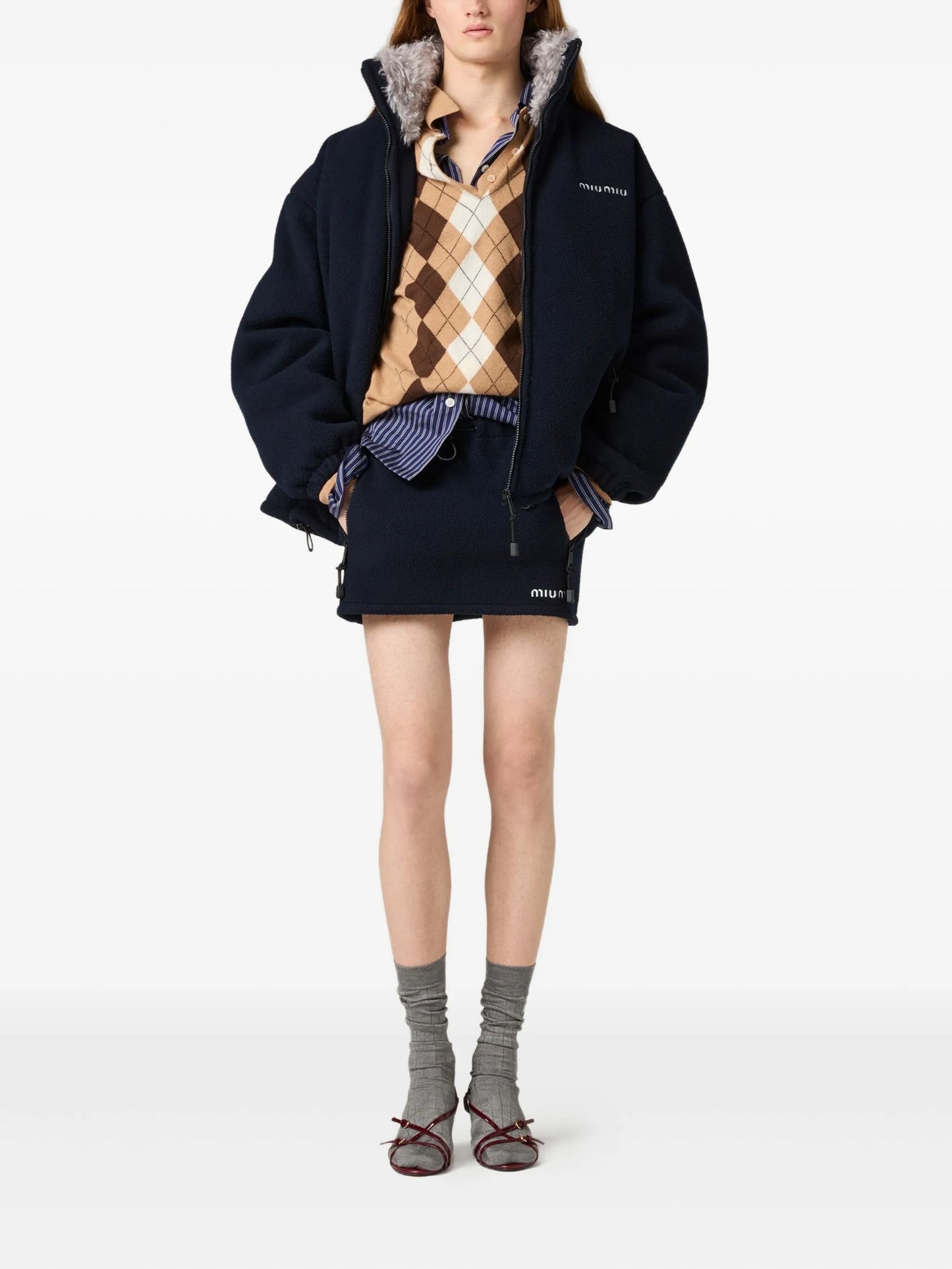 argyle three-button polo sweater