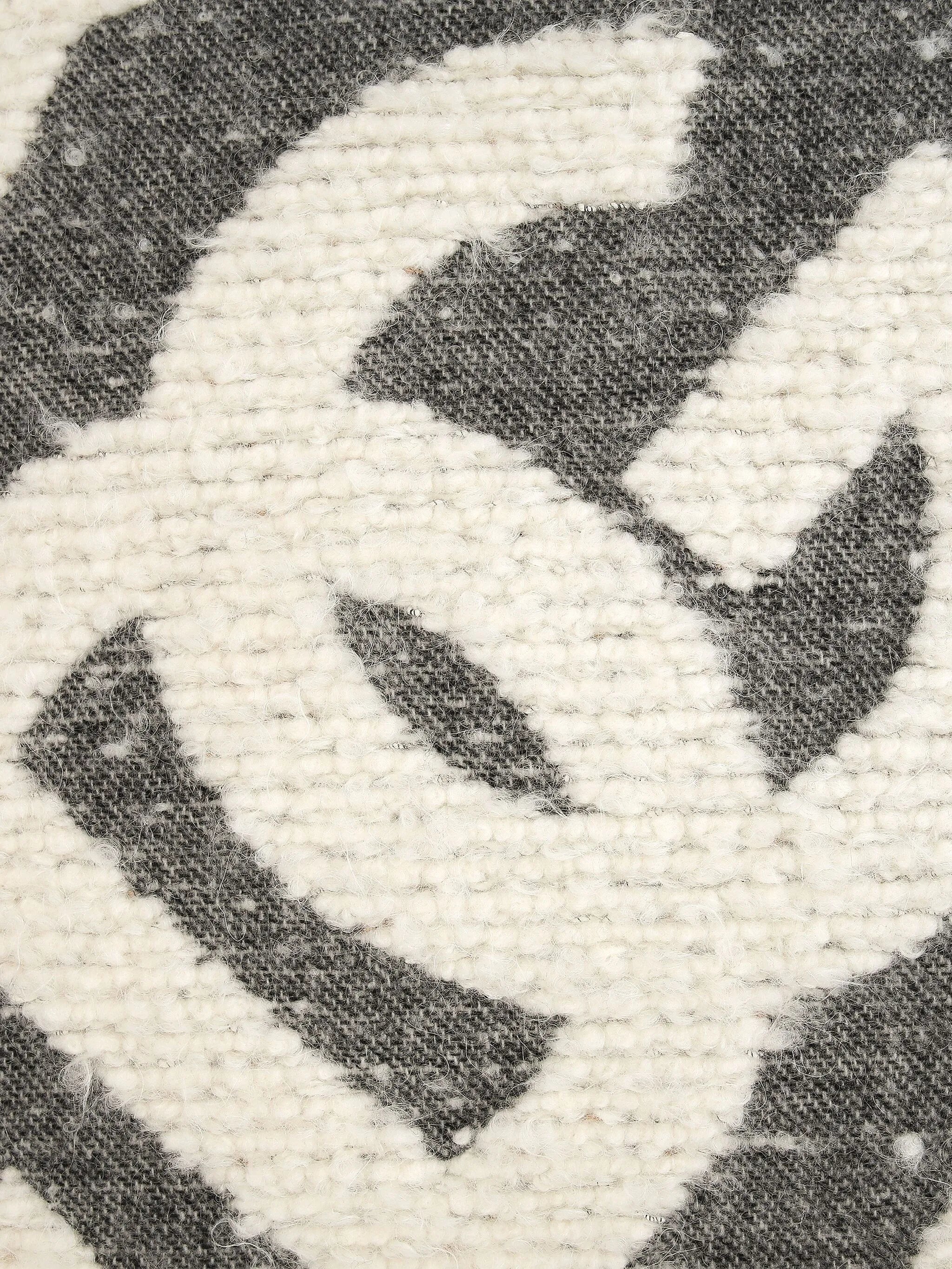 logo-patterned cushion
