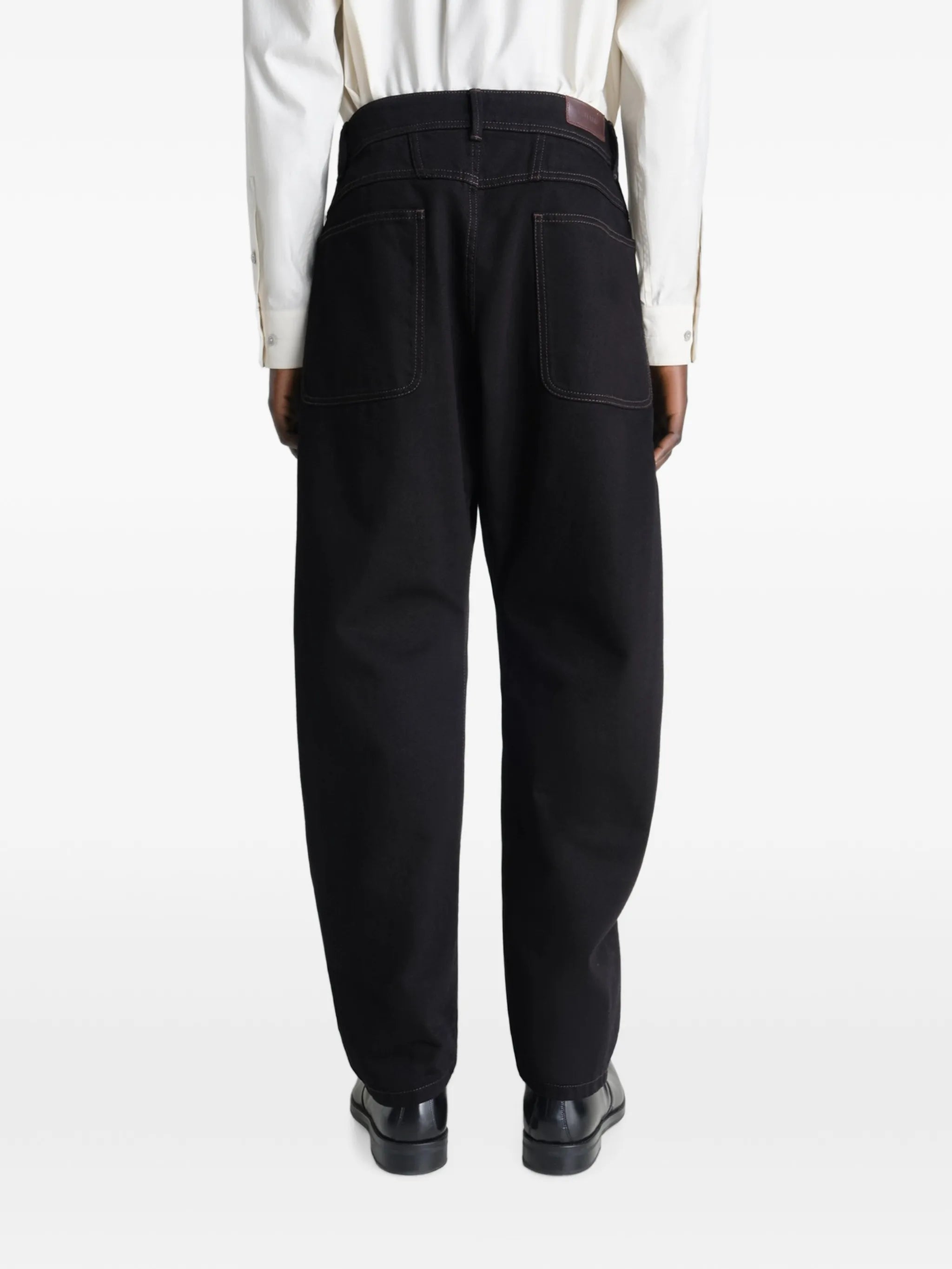 Twisted tapered jeans