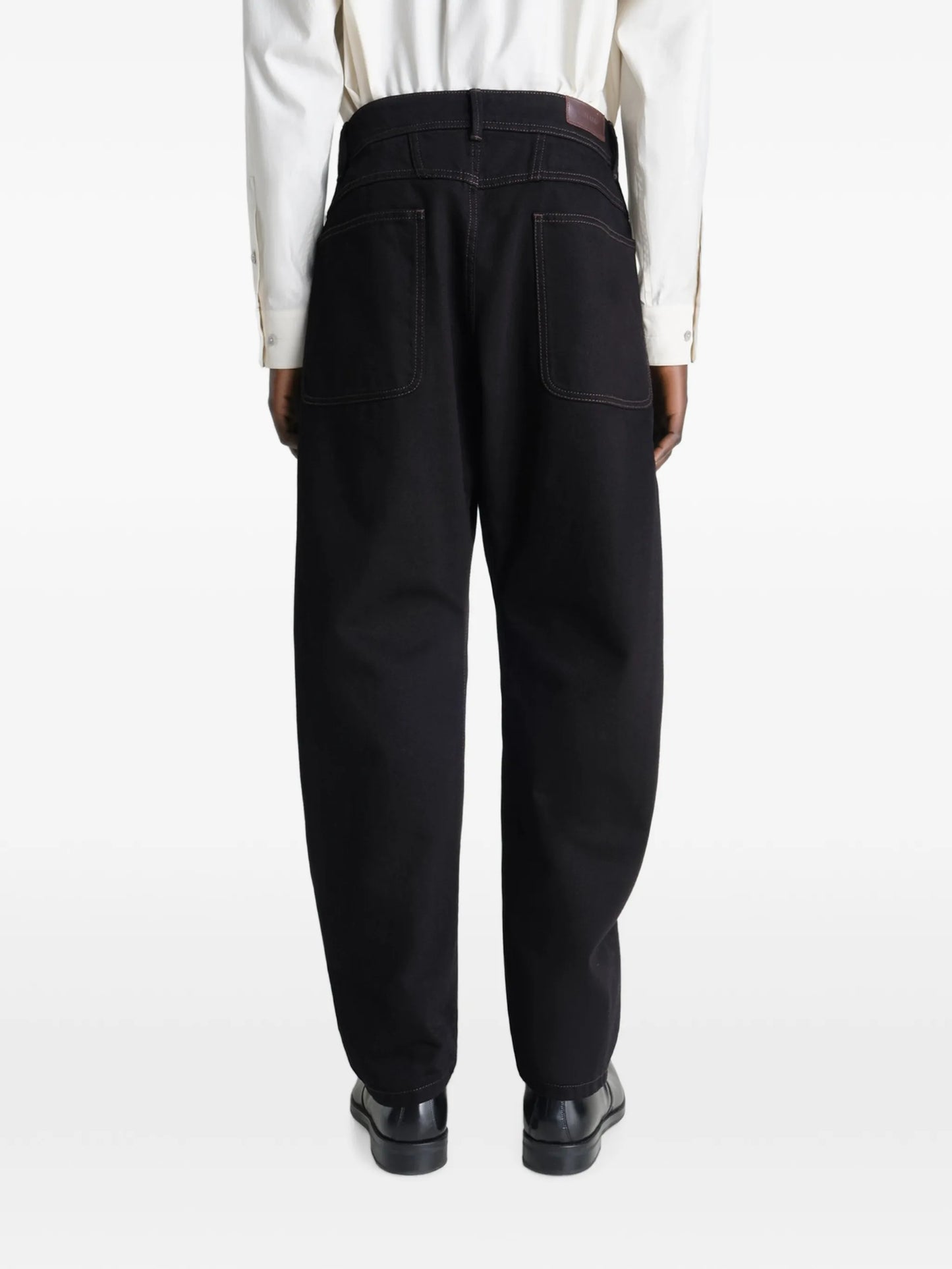 Twisted tapered jeans