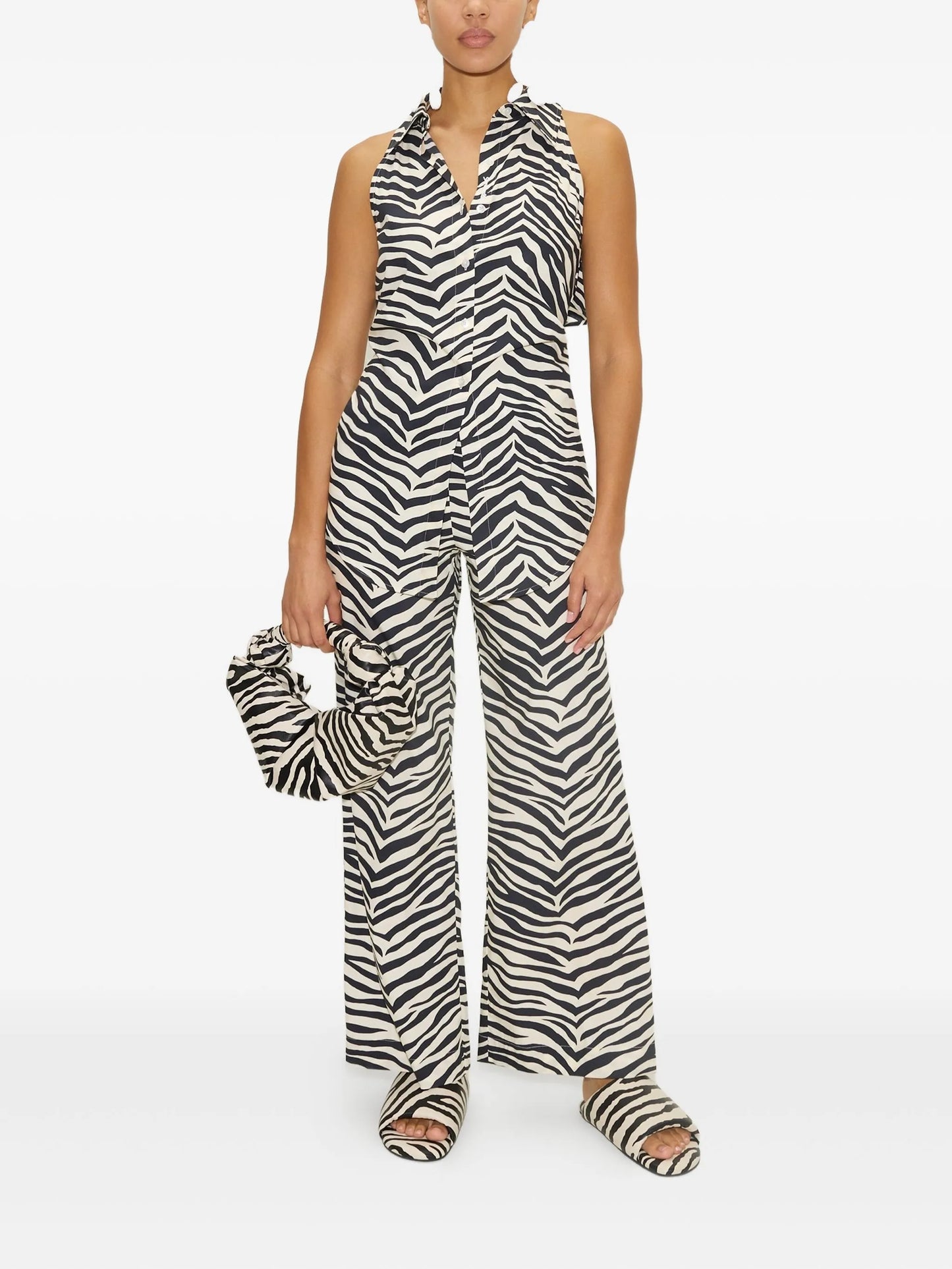 Loch sleeveless button-up top