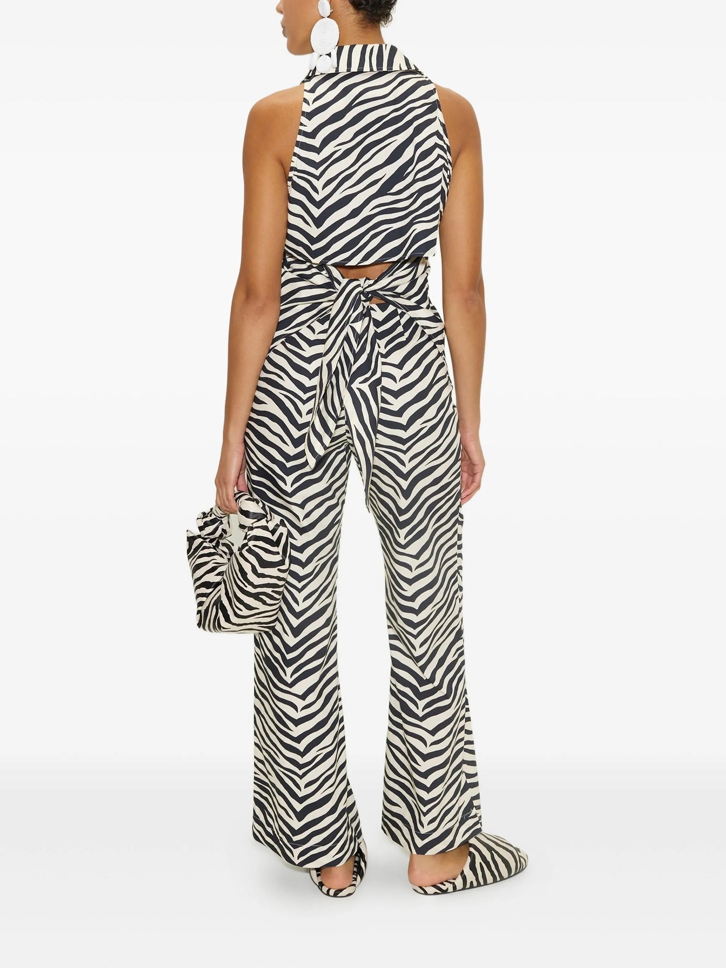 Loch sleeveless button-up top