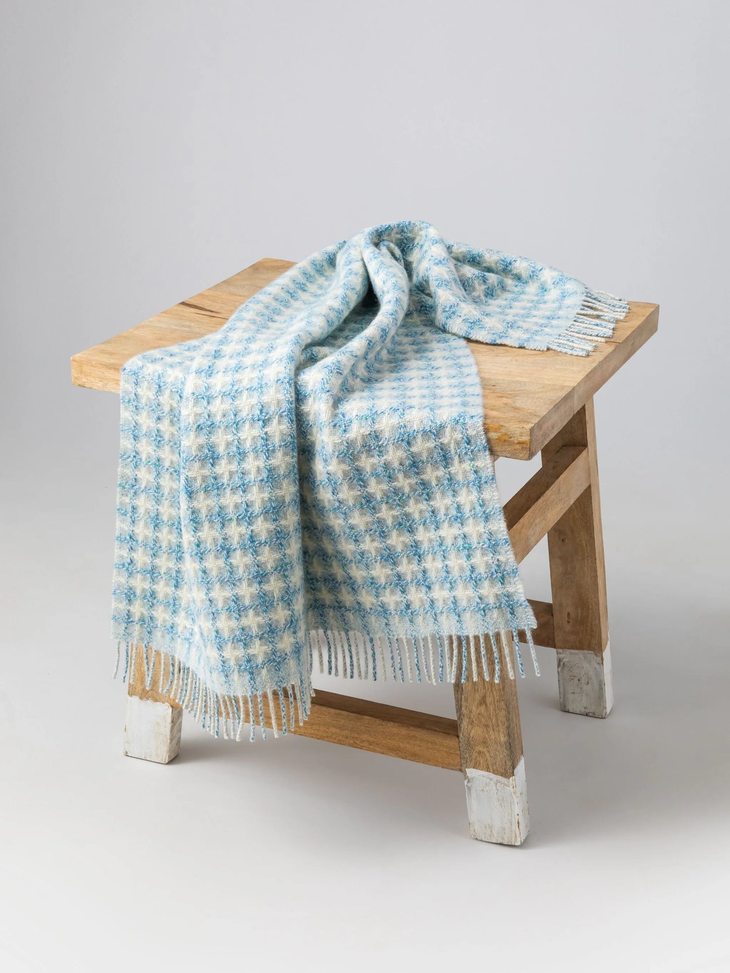 checked fringed blanket