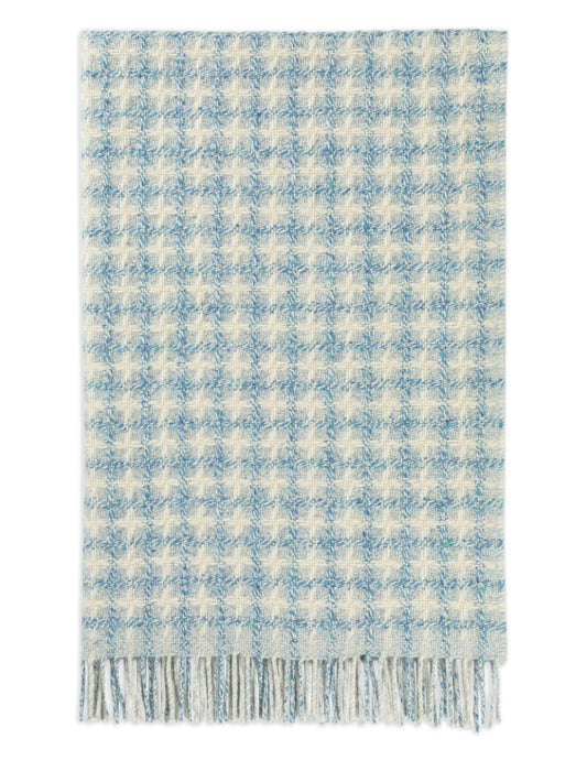 checked fringed blanket