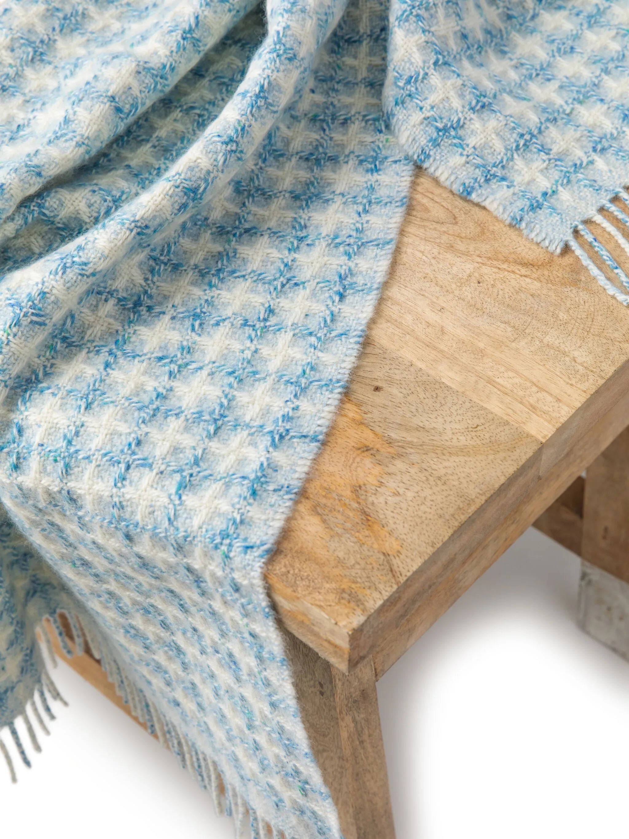 checked fringed blanket