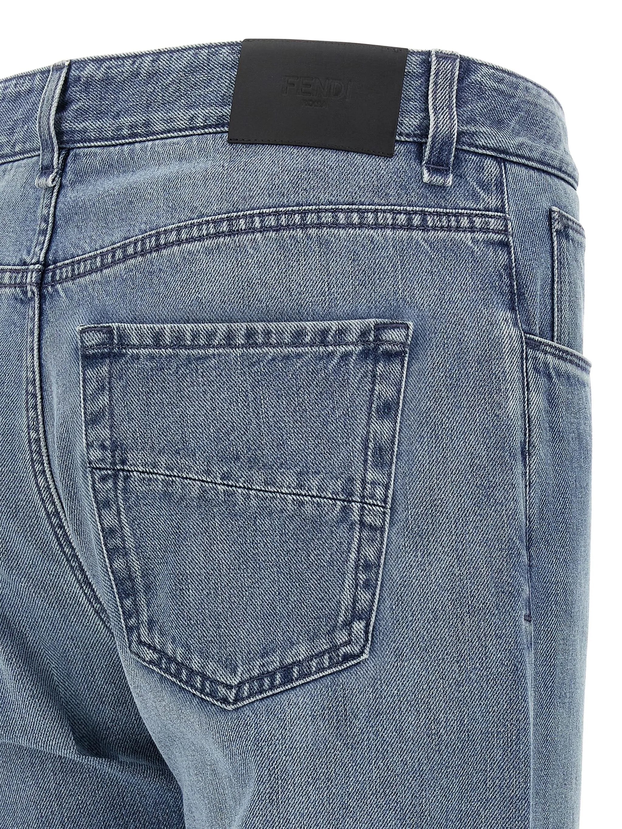 faded-effect five-pocket jeans