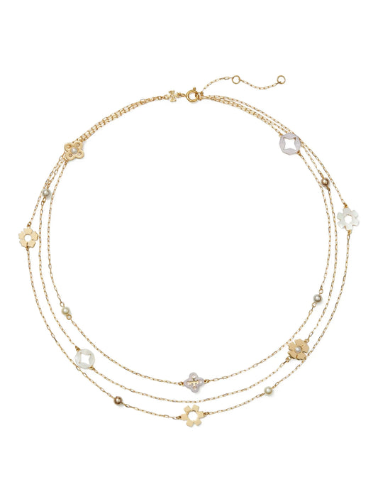 triple-strand flower-charm necklace