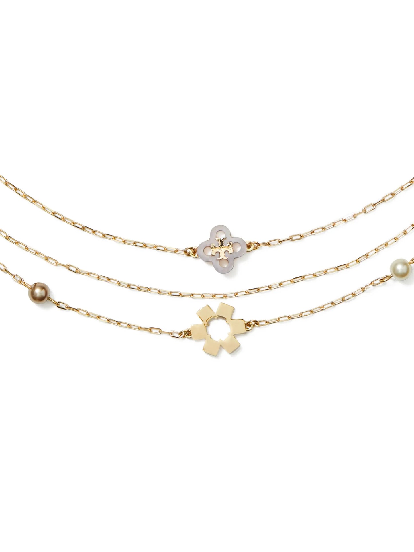 triple-strand flower-charm necklace