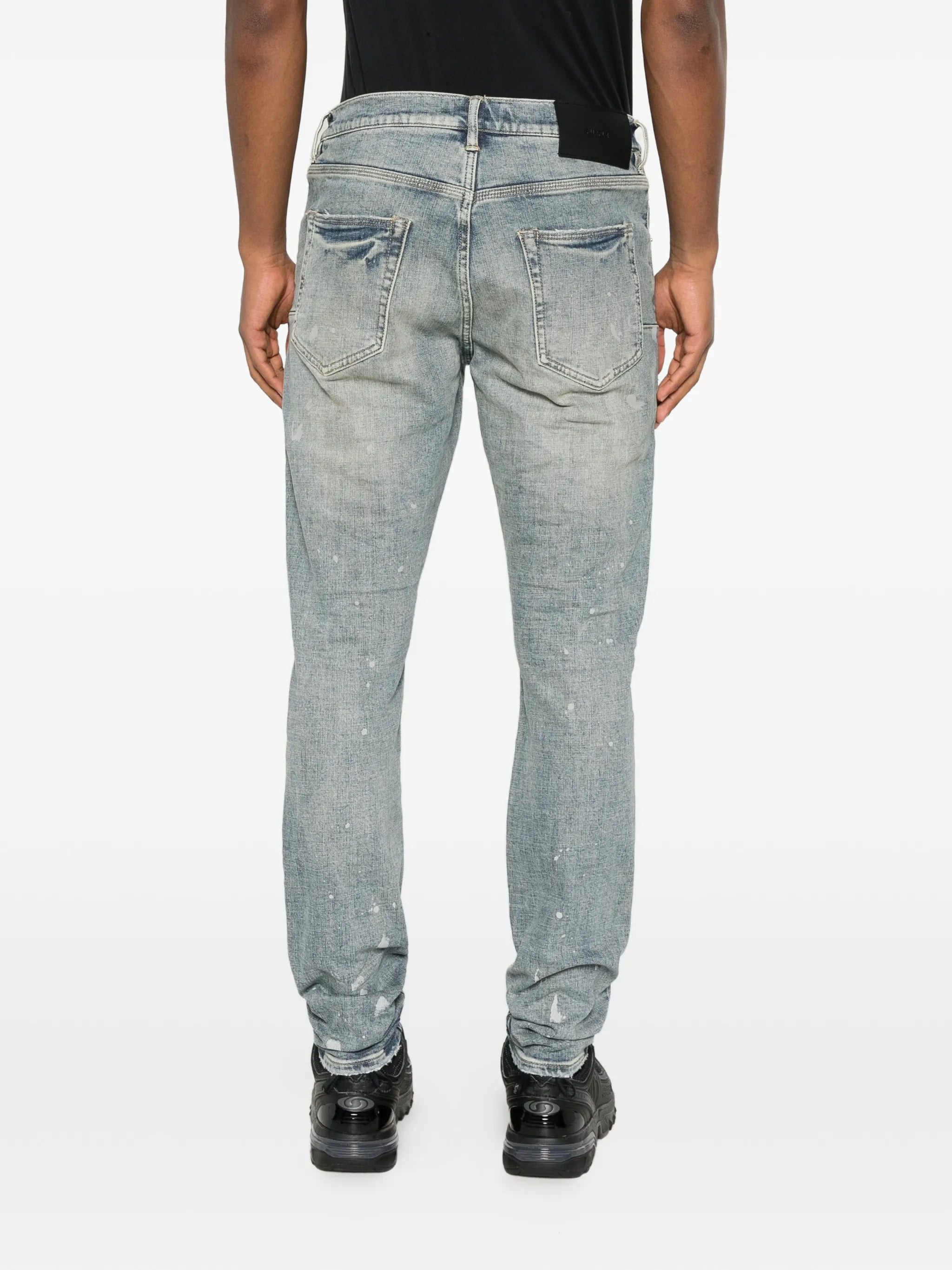 slashed paint jeans