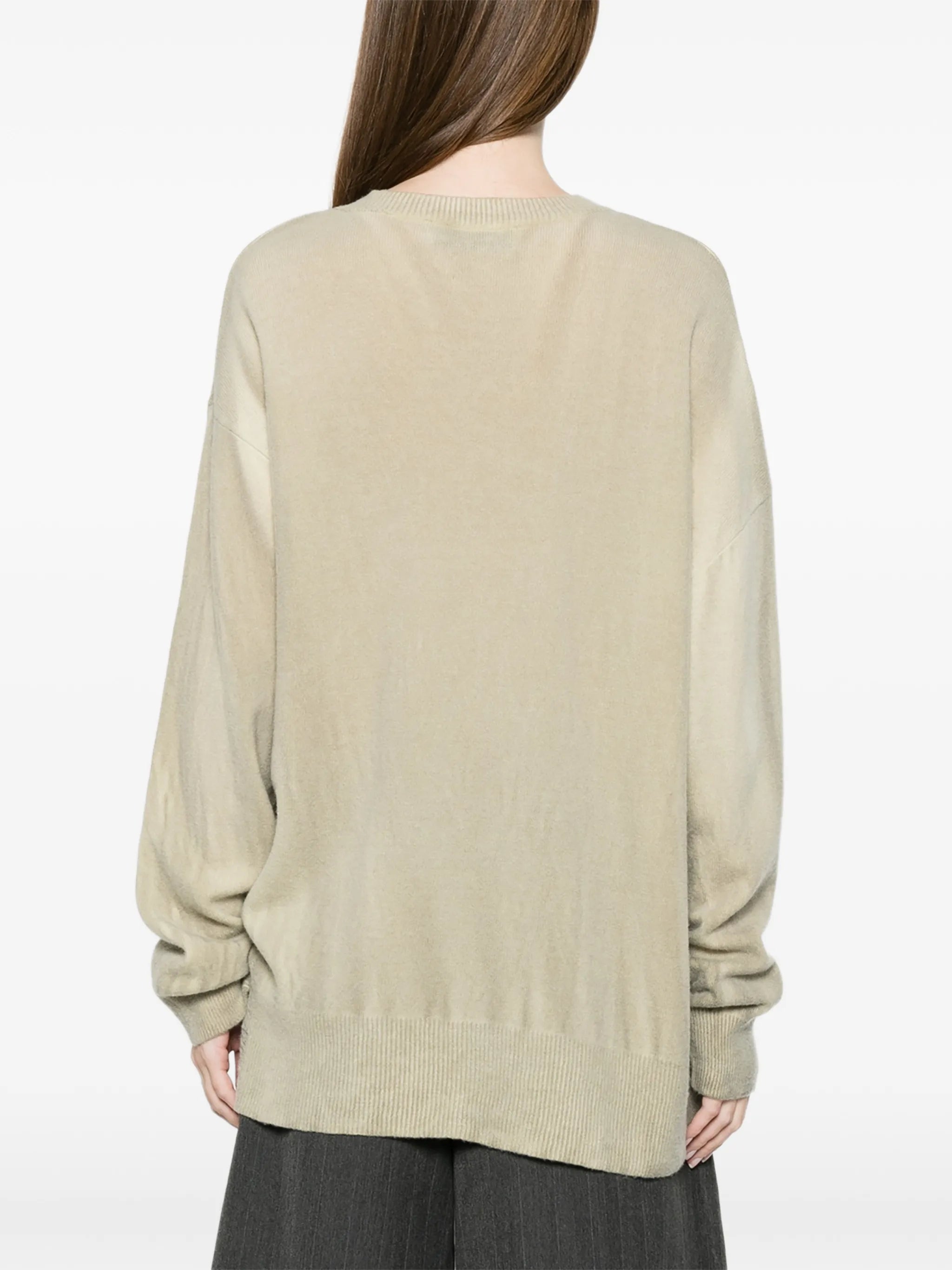 Slant distressed sweater