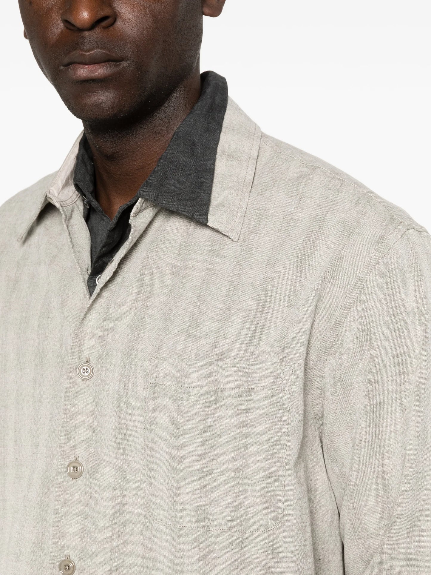 Above striped-pattern shirt