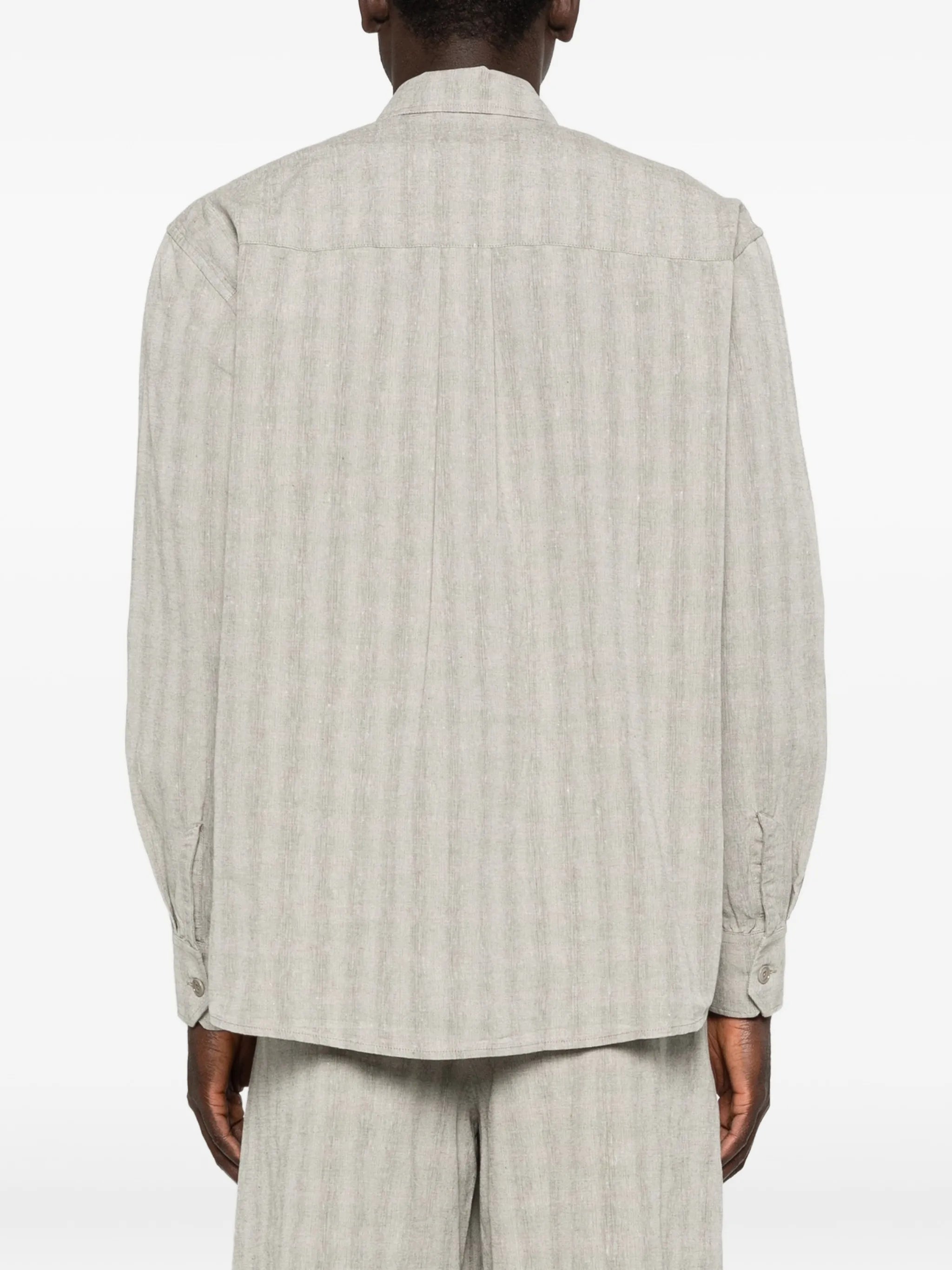 Above striped-pattern shirt