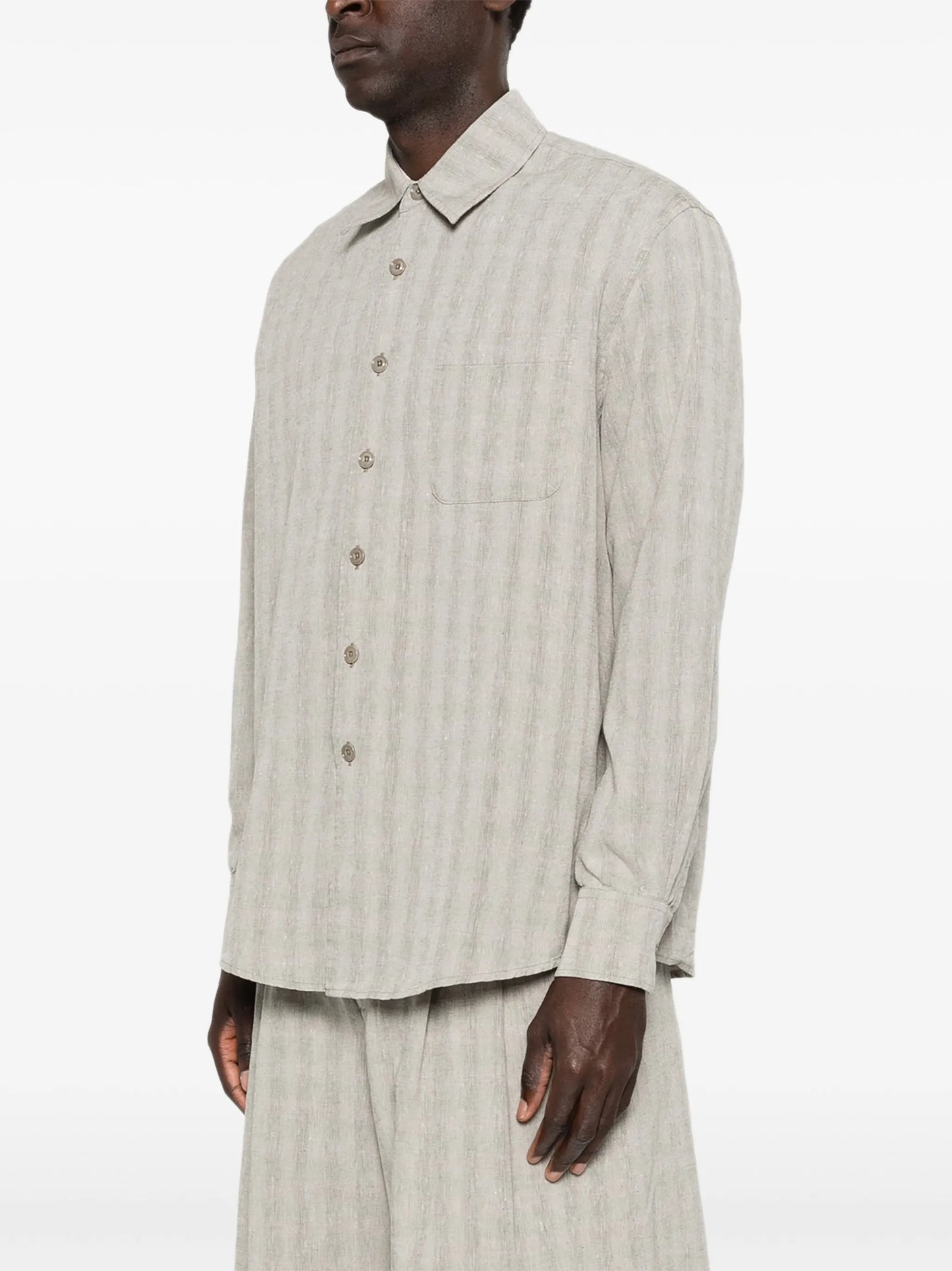 Above striped-pattern shirt
