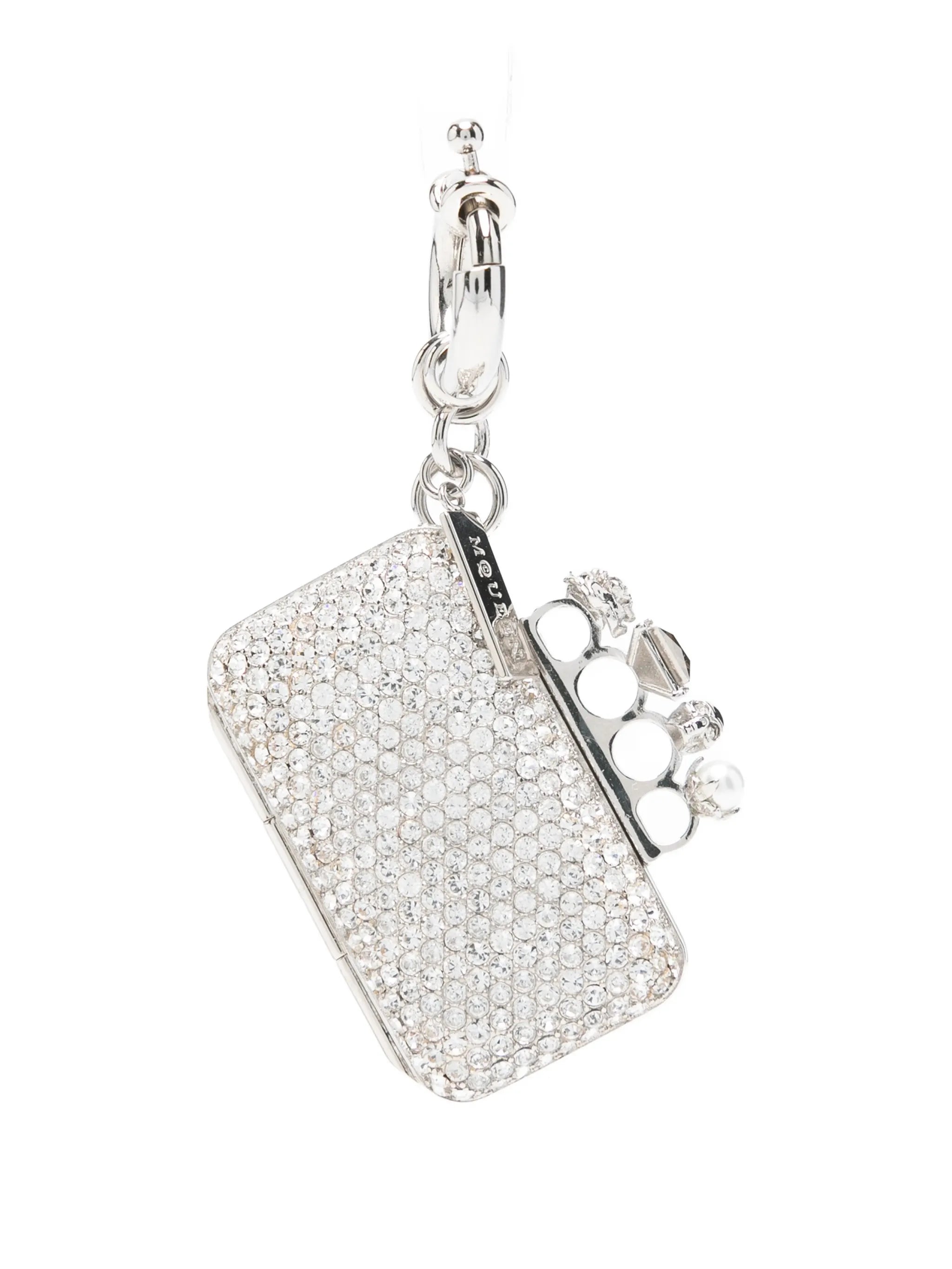 Knuckle clutch charm