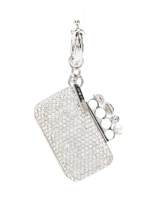 Knuckle clutch charm