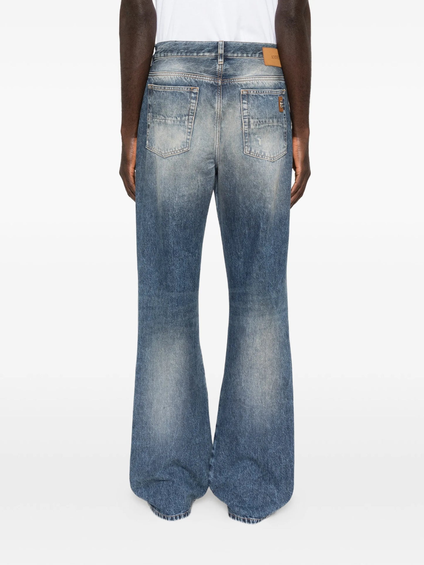 ripped-knees bootcut denim jeans