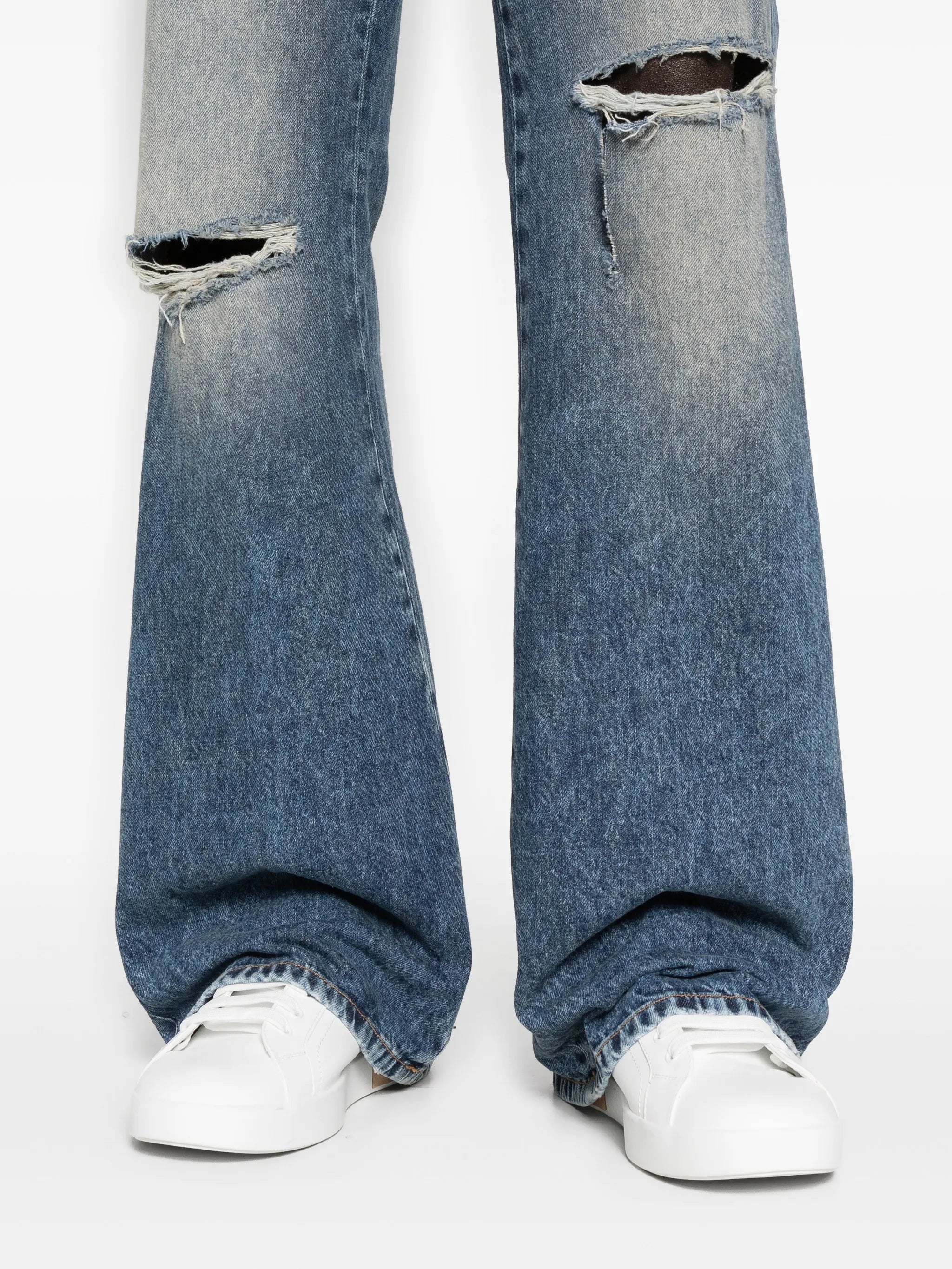 ripped-knees bootcut jeans
