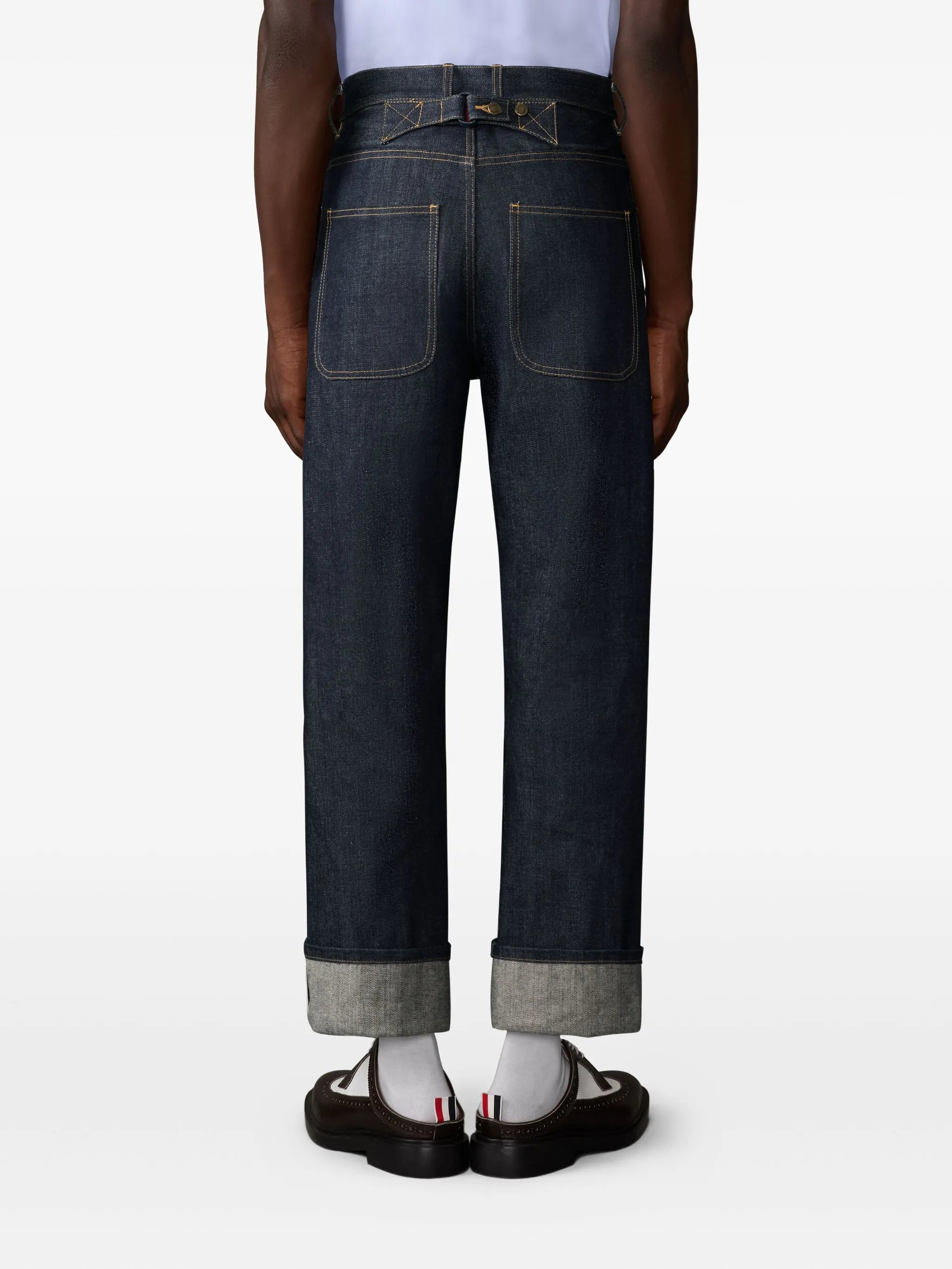 selvedge-detail backstrap trousers