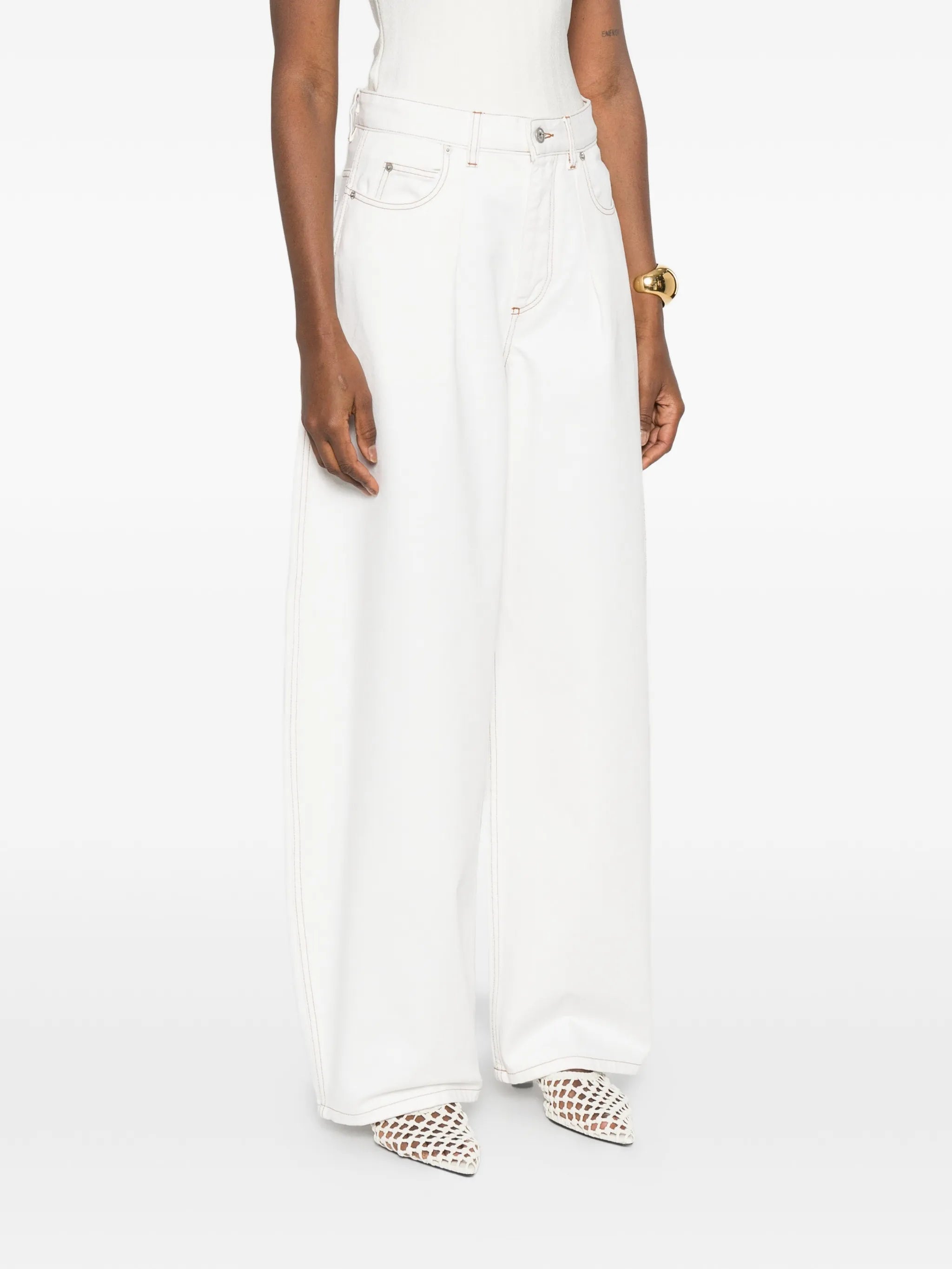 The Ovalo de-Nîmes high-waisted curved jeans