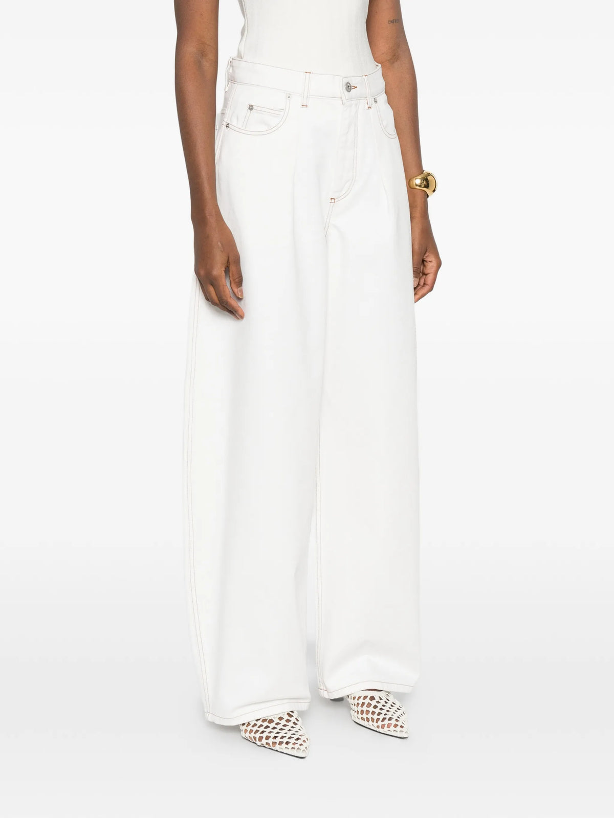 The Ovalo de-Nîmes high-waisted curved jeans