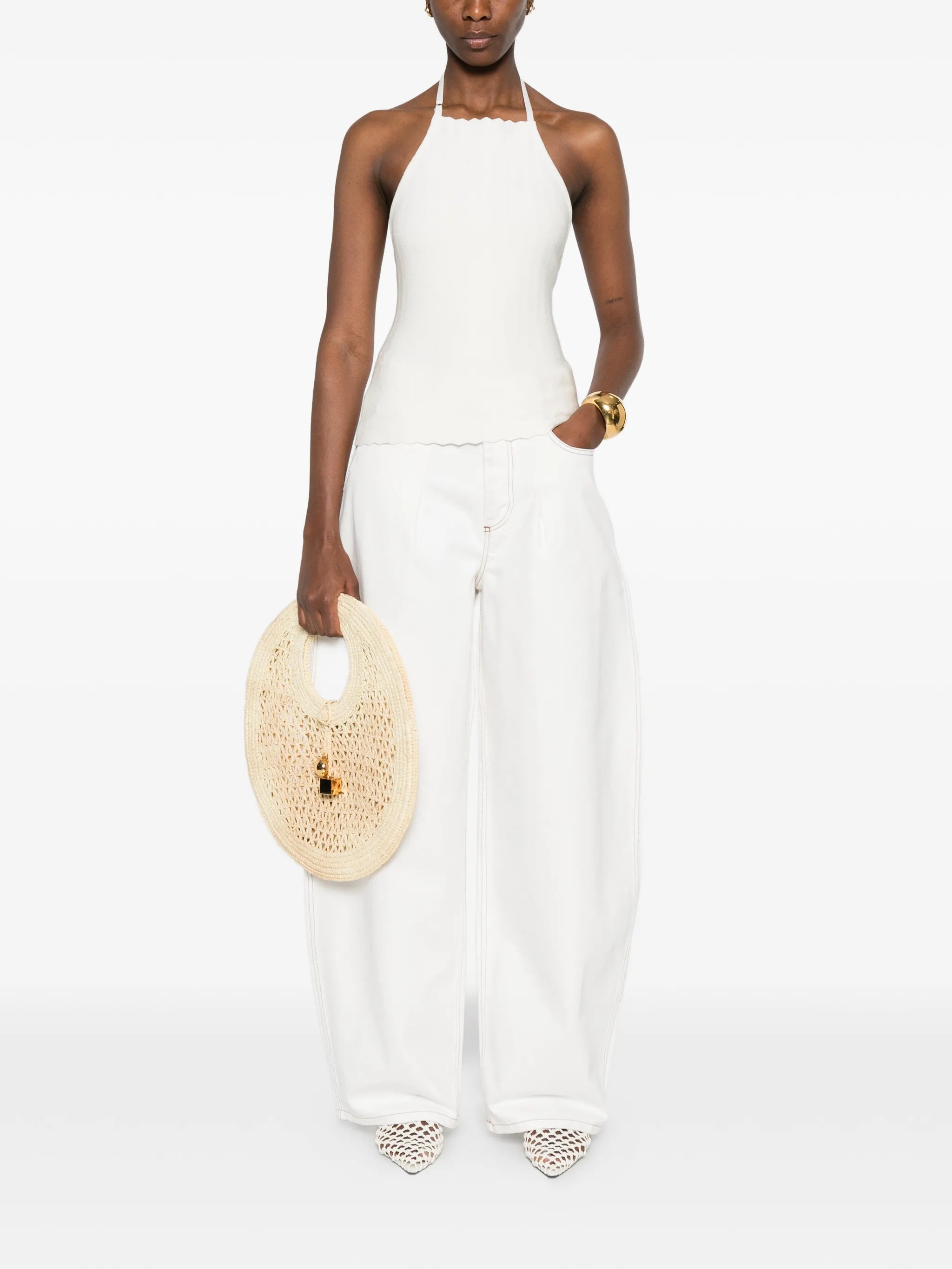 The Ovalo de-Nîmes high-waisted curved jeans
