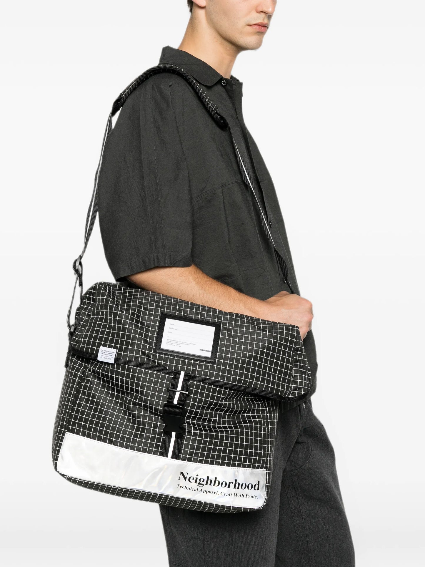 grid-pattern messenger bag