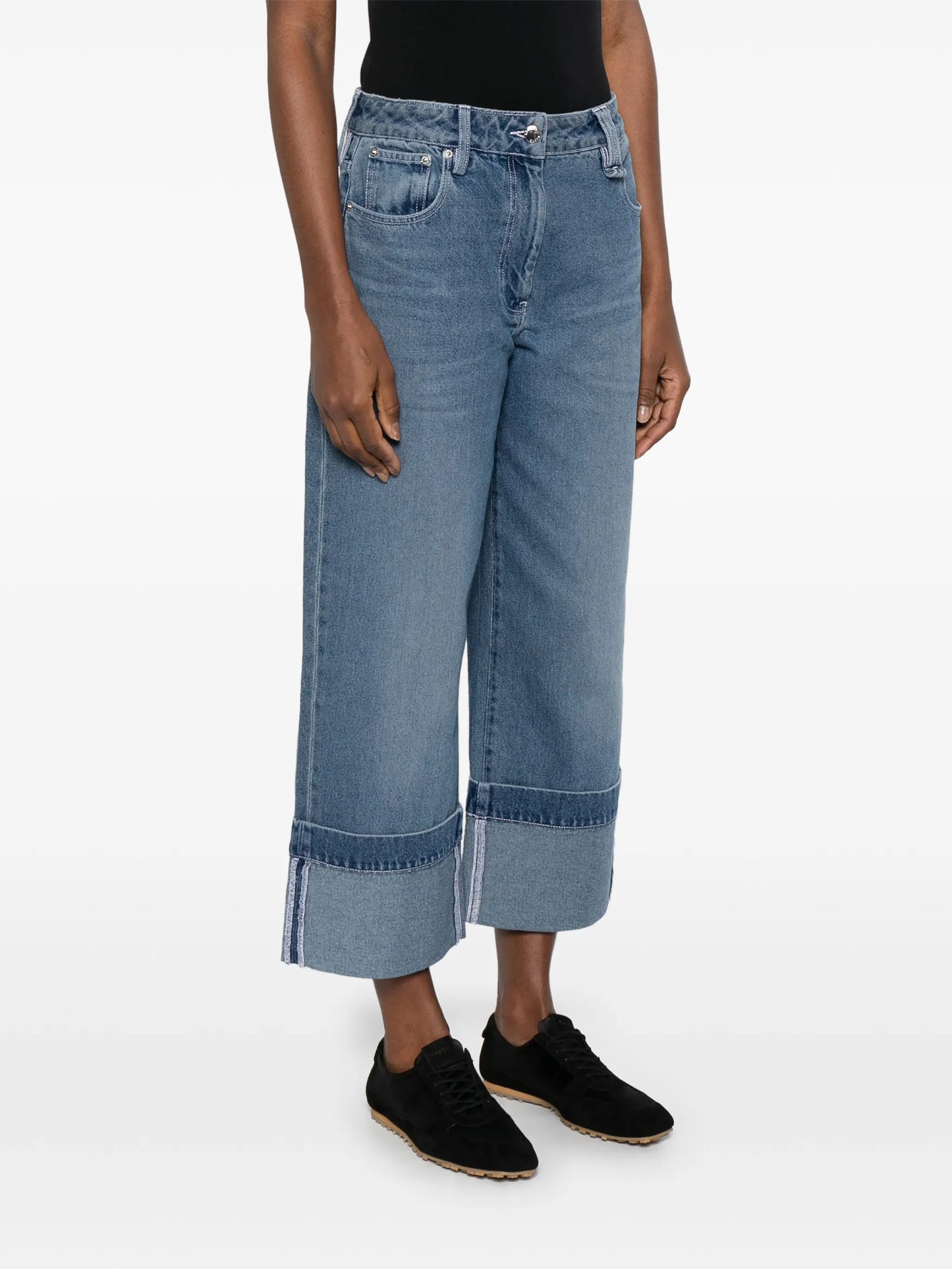 strap-ebellished jeans