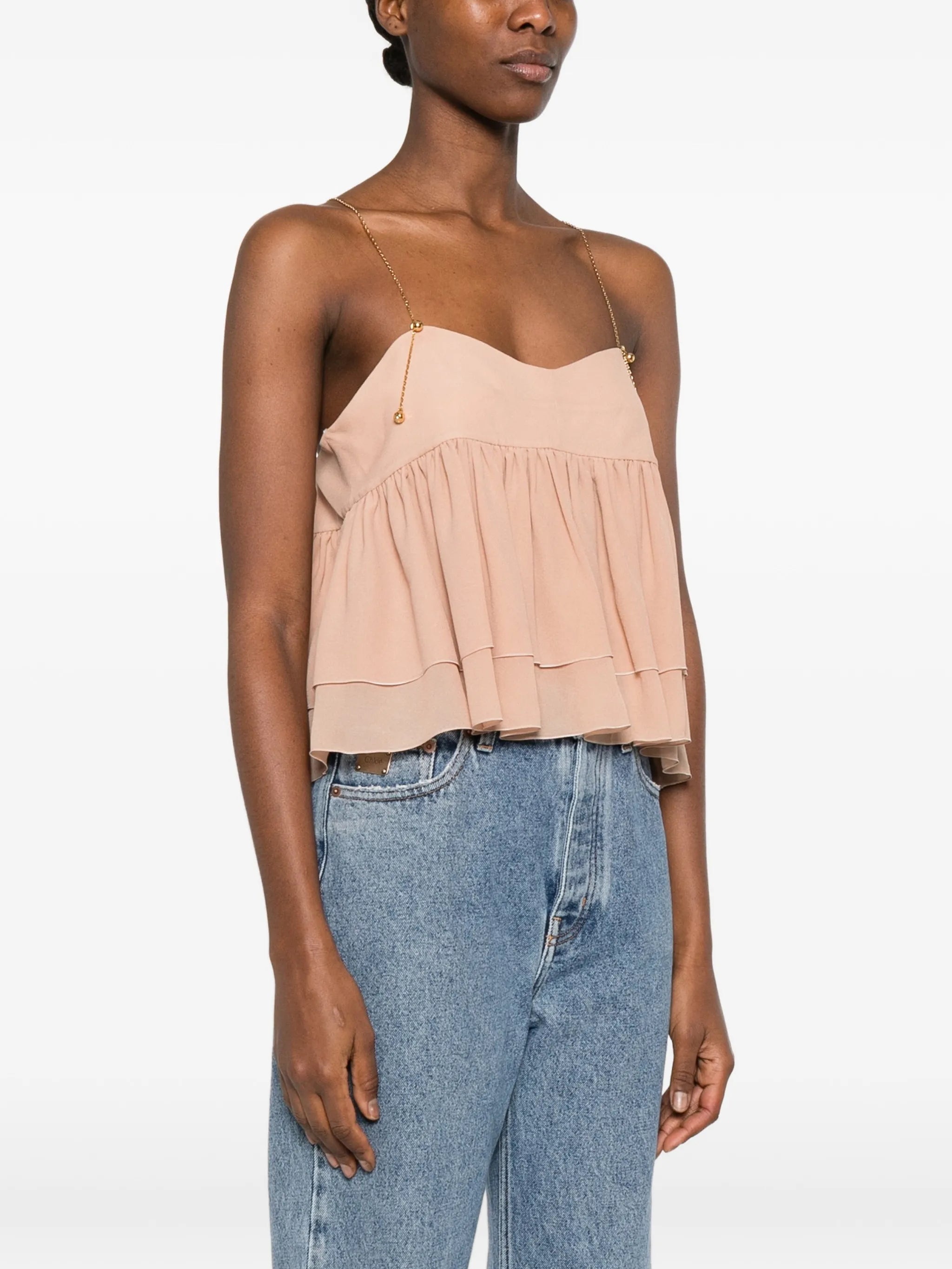 sleeveless ruffled top in silk georgette