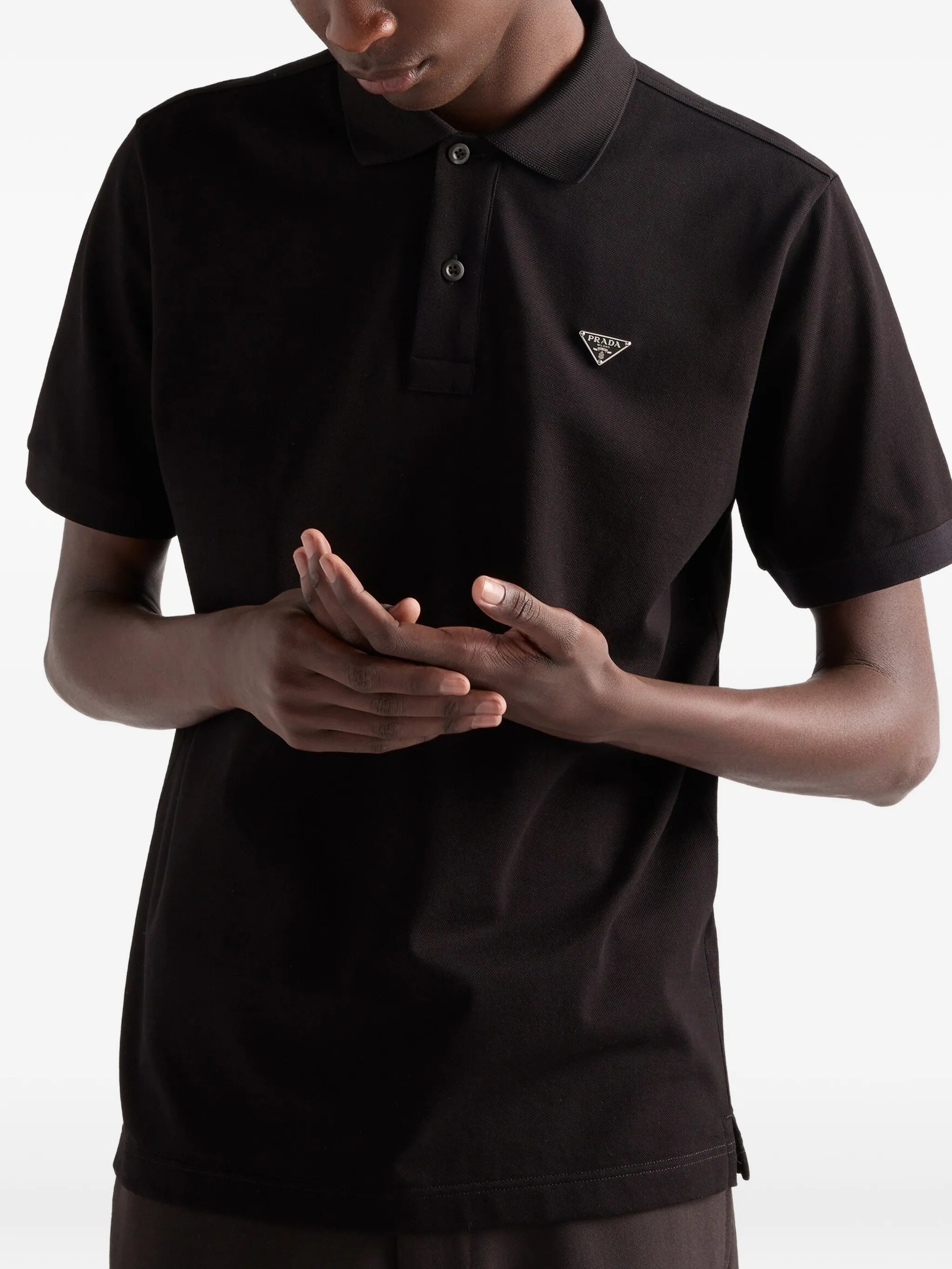 ribbed knit triangle logo polo shirt