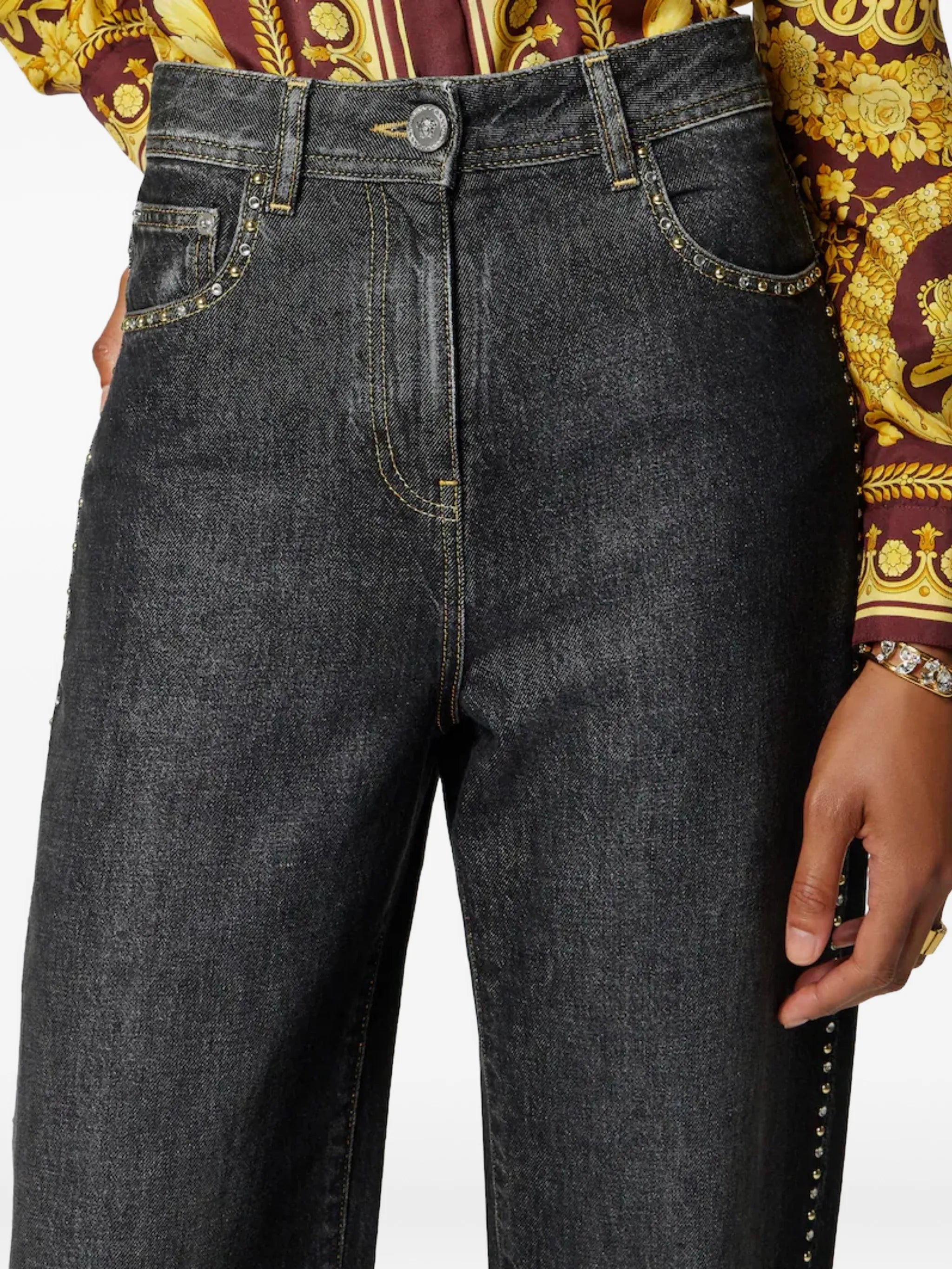 studded high-waist denim trousers