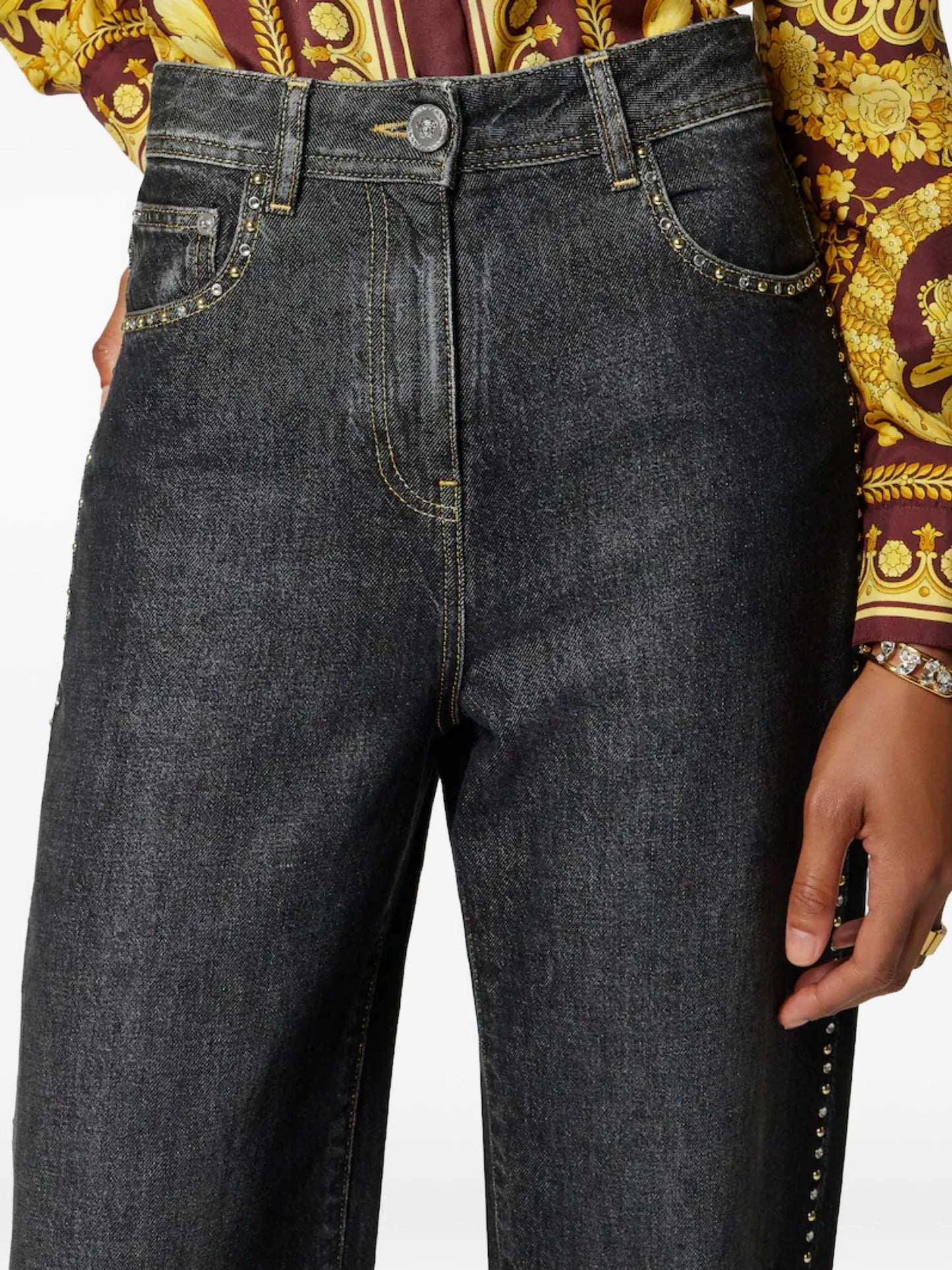studded high-waist denim trousers
