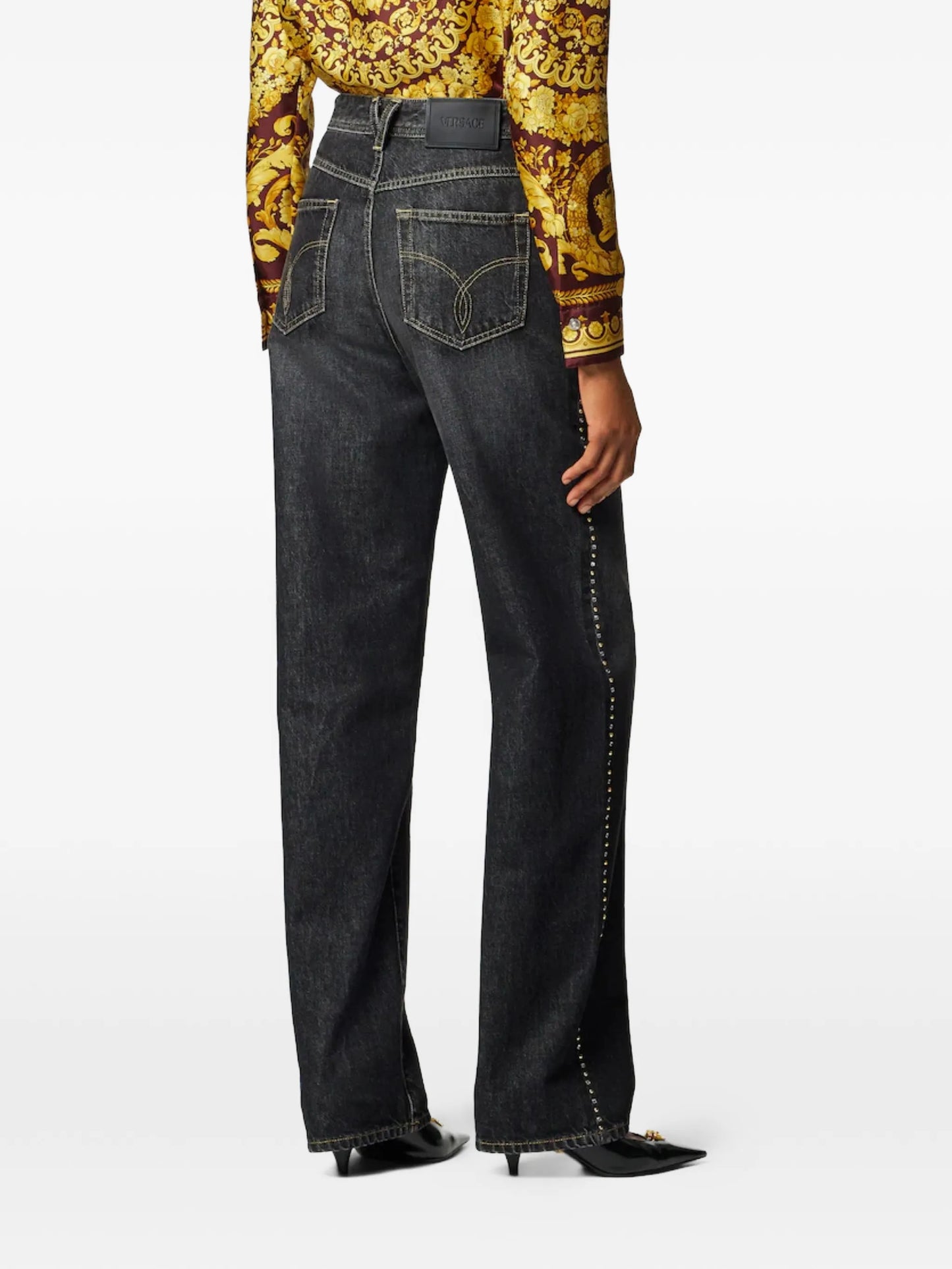 studded high-waist denim trousers