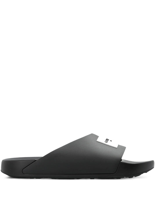 Label Slide mules in rubber