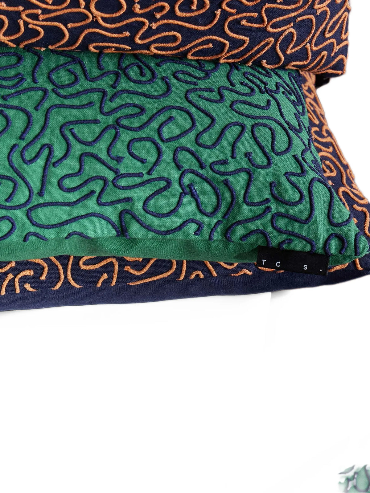 Ripple embroidered cushion cover
