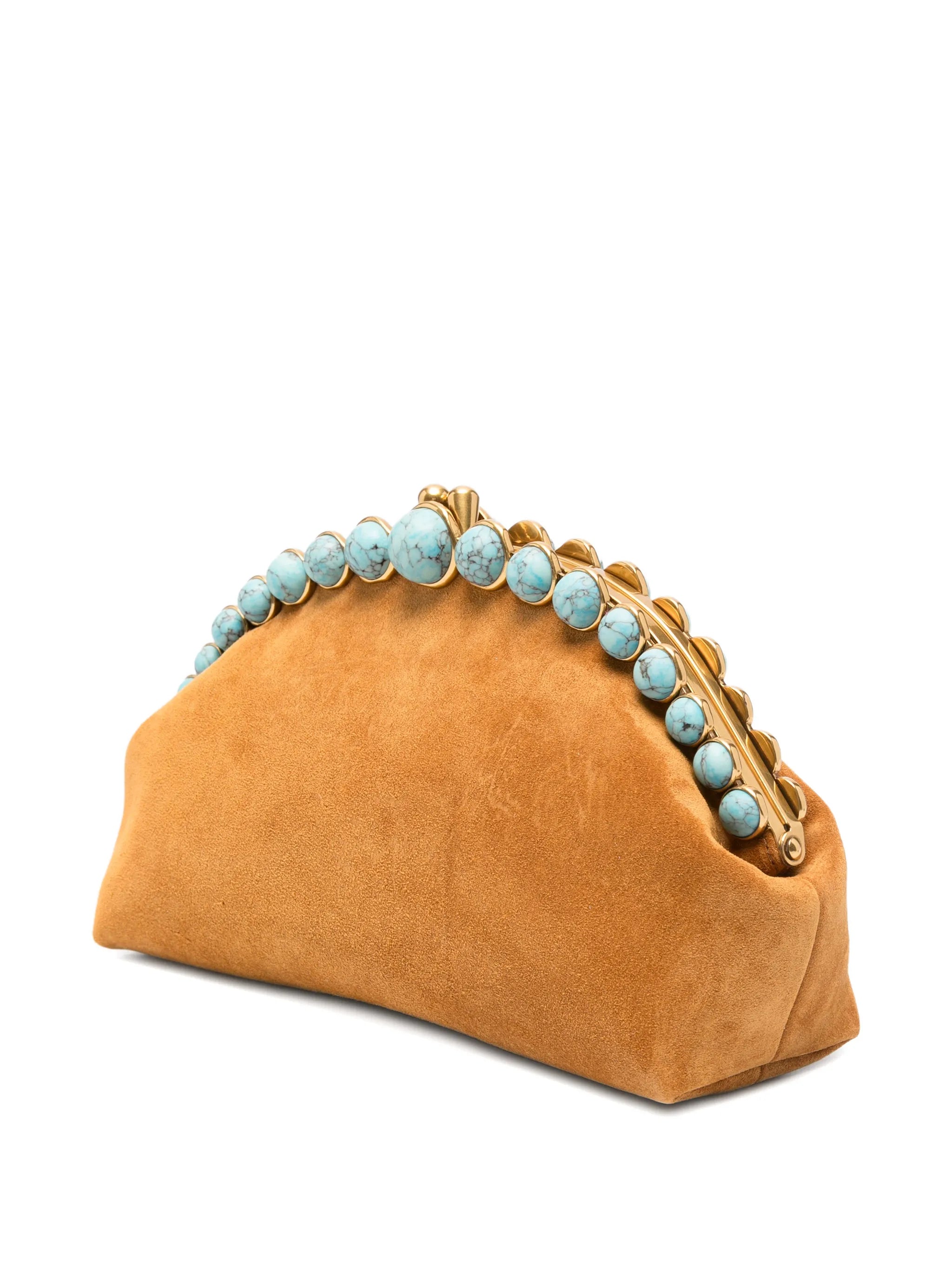 Una stone-embellished suede clutch bag