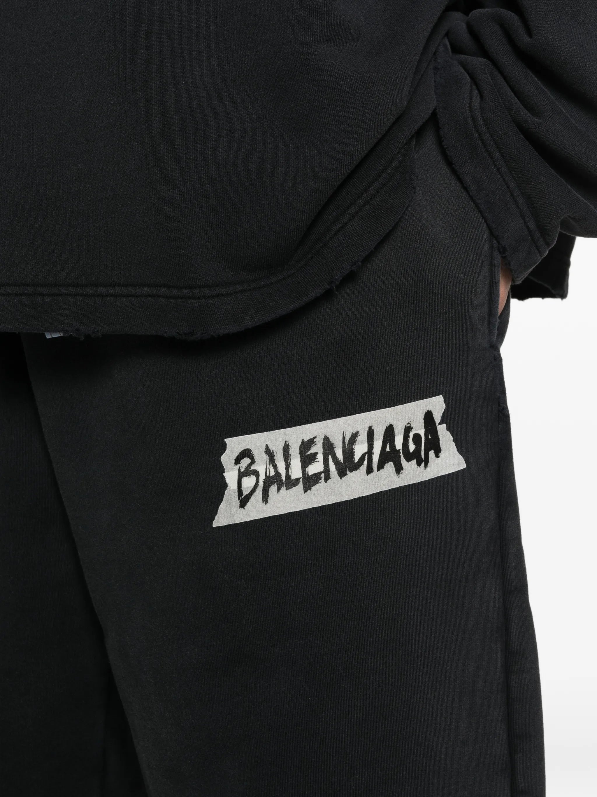 masking-tape track pants