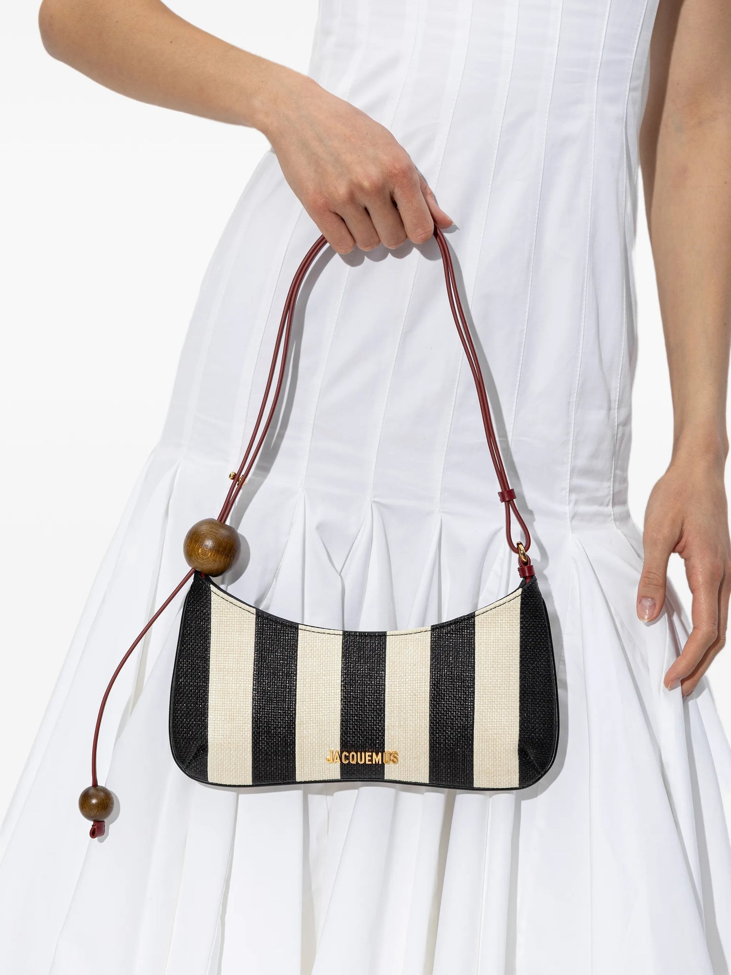 The Bisou Perle striped shoulder bag