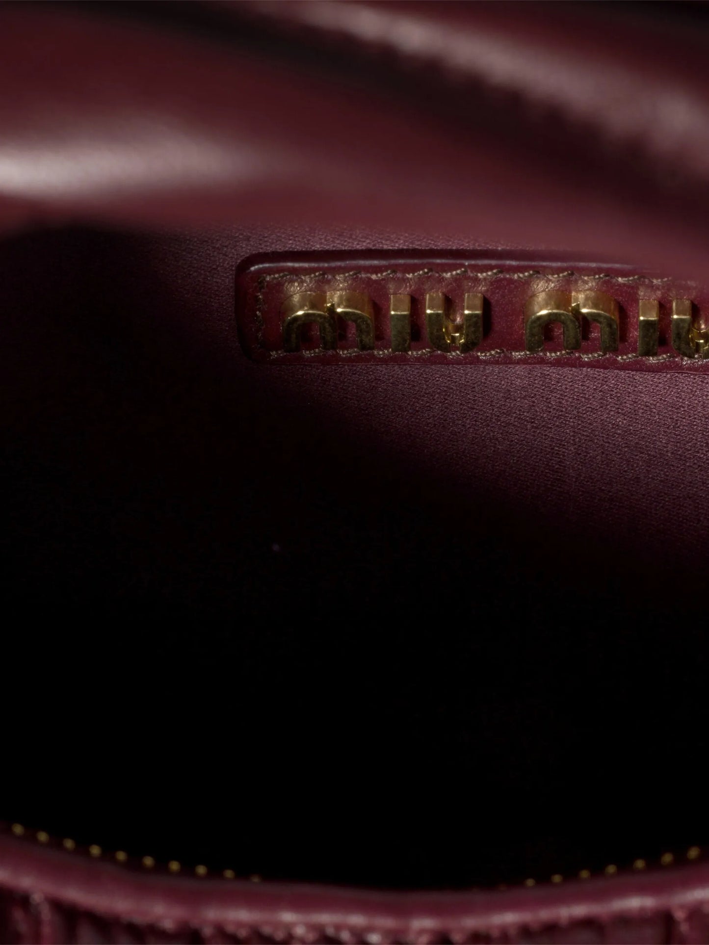 Wander matelassé leather mini-bag