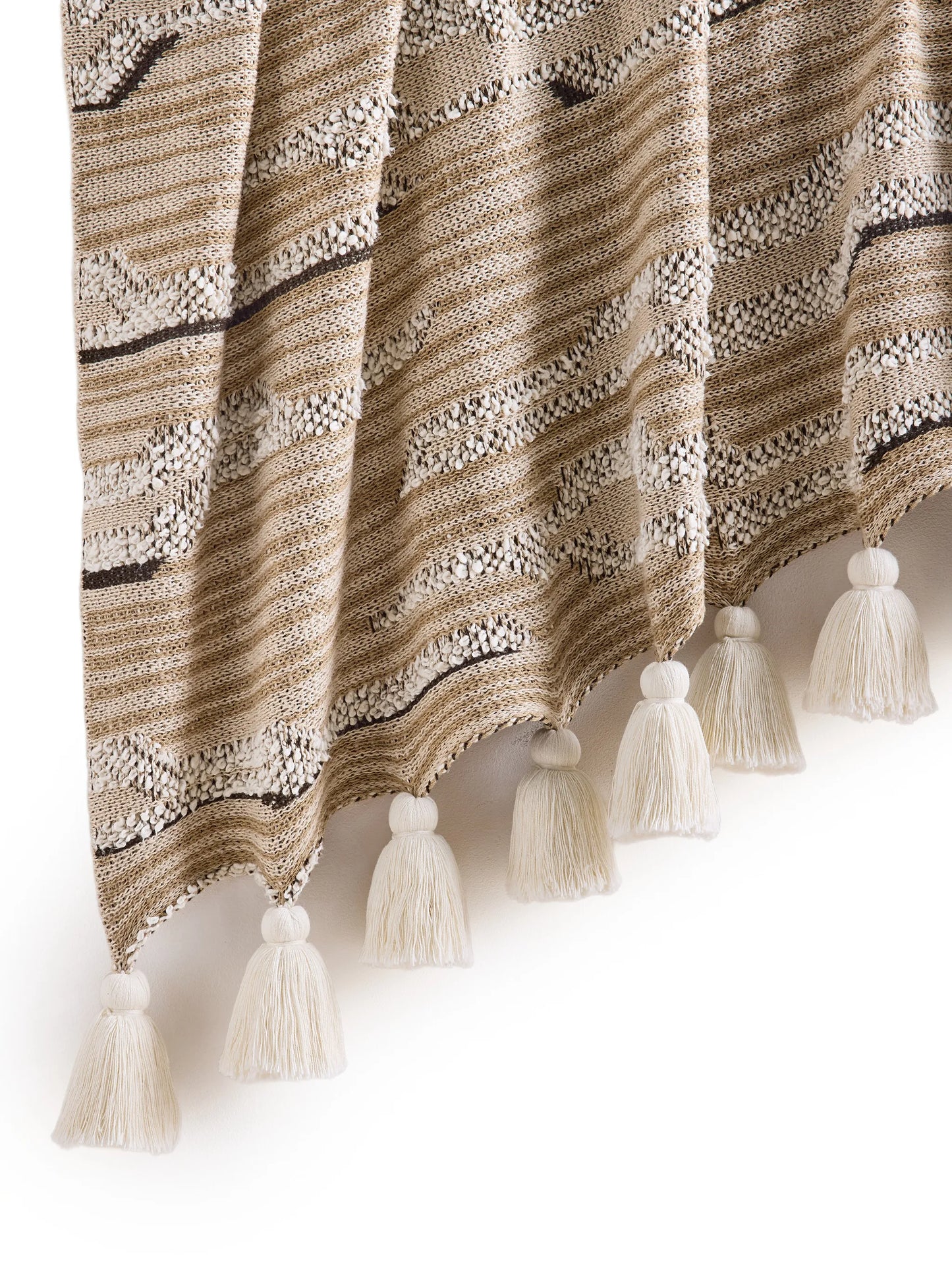 Cloud knitted tassel-detail throw