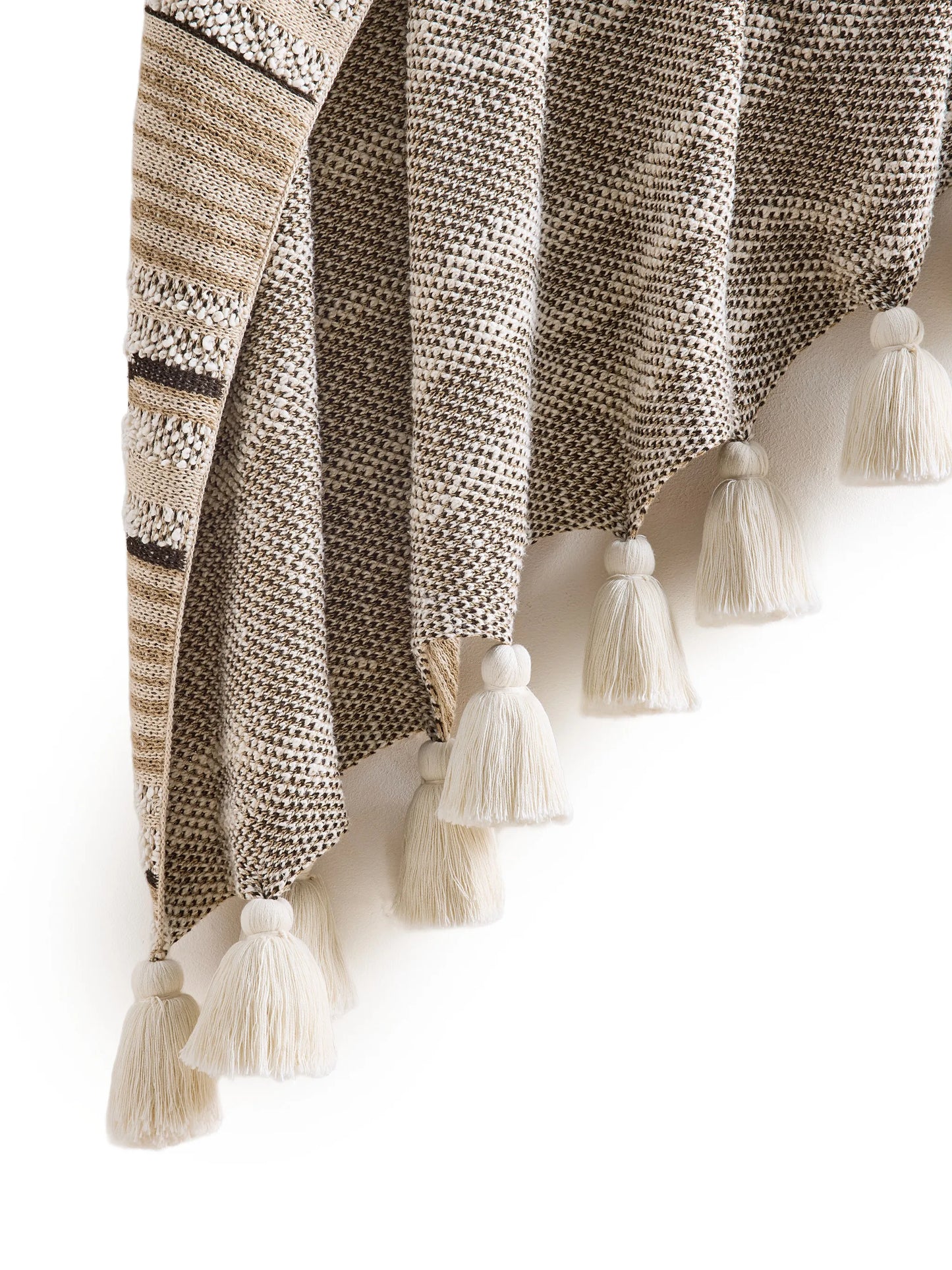 Cloud knitted tassel-detail throw