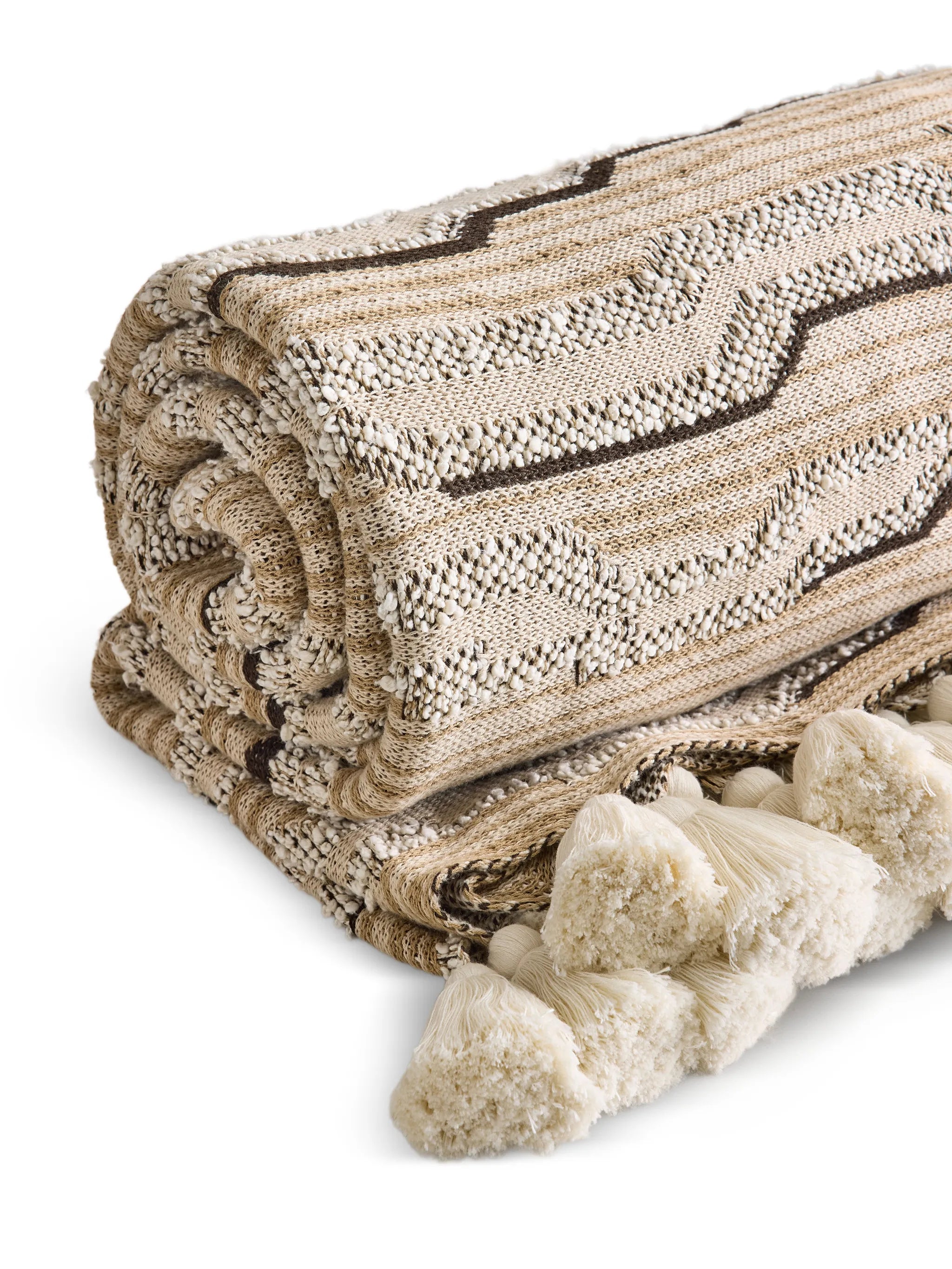 Cloud knitted tassel-detail throw