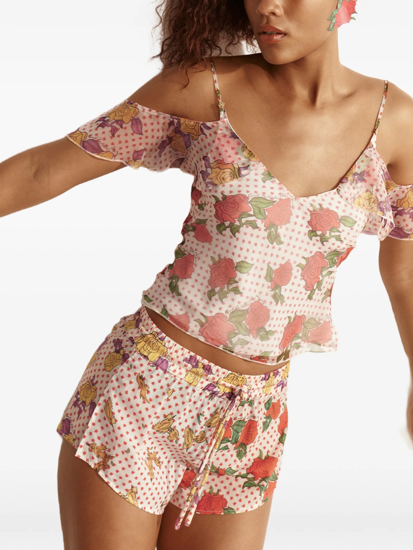 floral-print ruffled blouse
