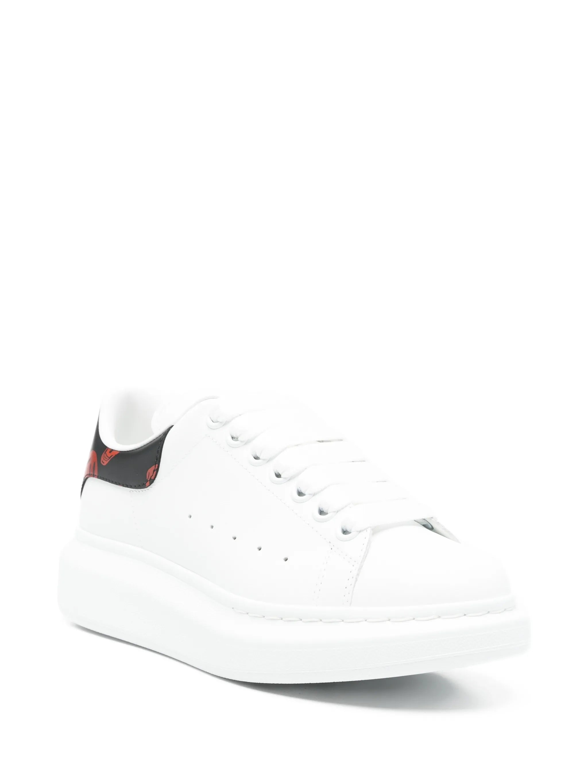 Oversized low-top skull-details sneakers