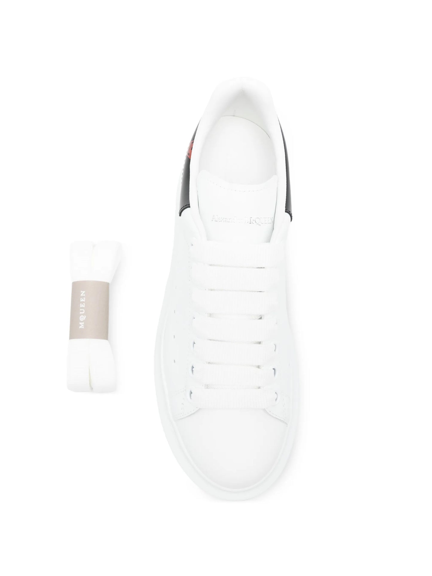 Oversized low-top skull-details sneakers